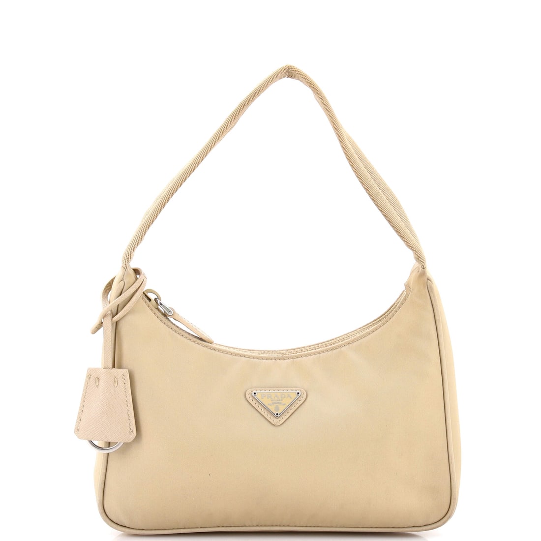 Prada Re-Edition 2000 Hobo Tessuto Mini: From the Prada archive, the Re-Edition 2000 Hobo carries the kind of architecture that translates clearly across daytime, travel, and evening rotation. The leatherwork is in tessuto, Prada's signature