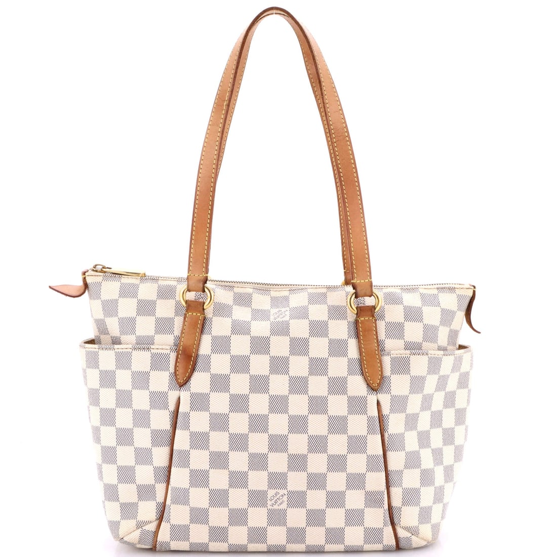 Louis Vuitton Totally Handbag Damier PM: Presented here, the Louis Vuitton Totally Handbag arrives with the proportions and stance that the house refined into a recognizable signature. Construction sits in the Damier coated canvas, Vuitton's