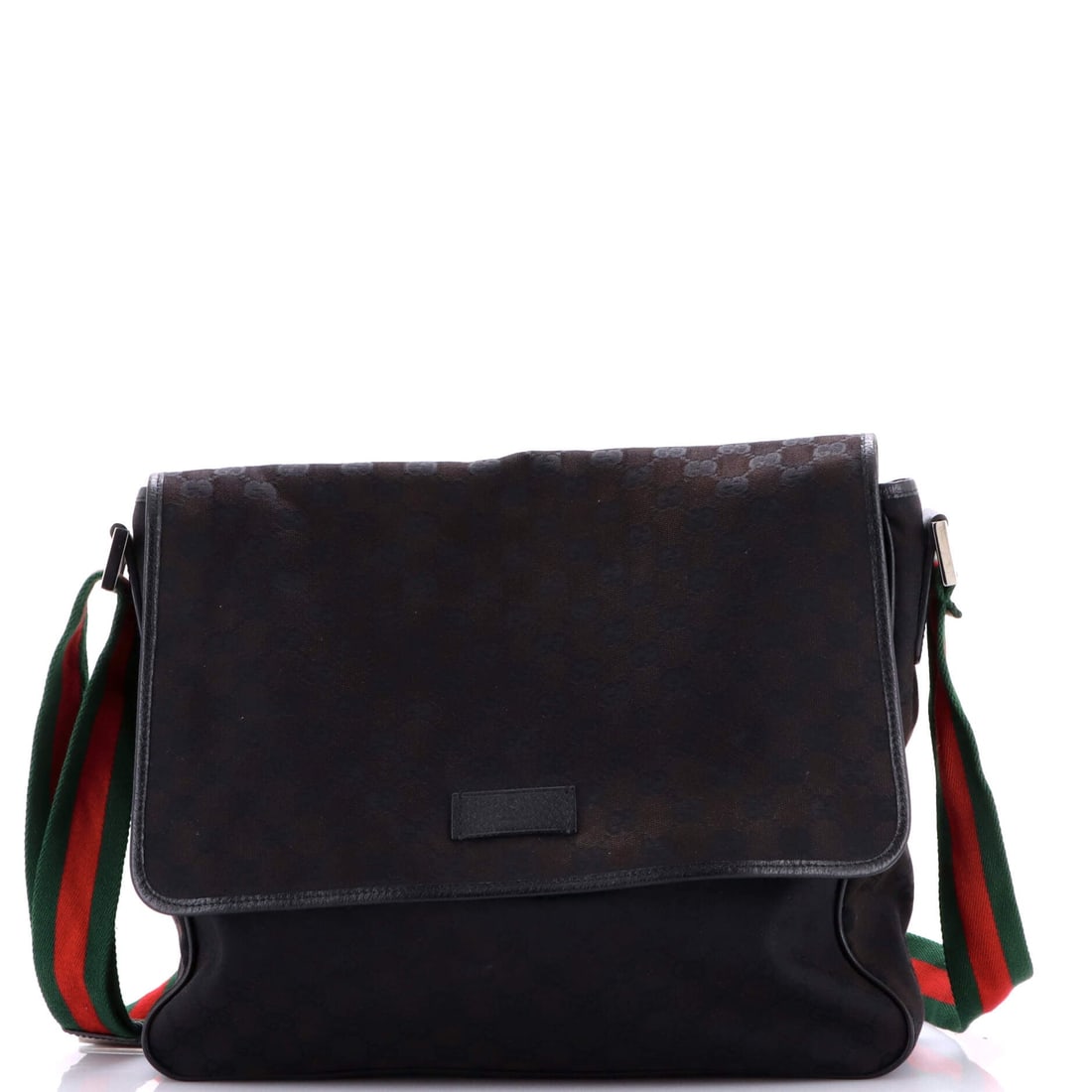 Gucci Web Strap Flap Messenger GG Canvas Medium: Gucci built the Web Strap Flap Messenger as a piece that holds its own in a wardrobe rather than competing with it. The leatherwork is in the GG coated canvas, Gucci's instantly recognizable double-G 