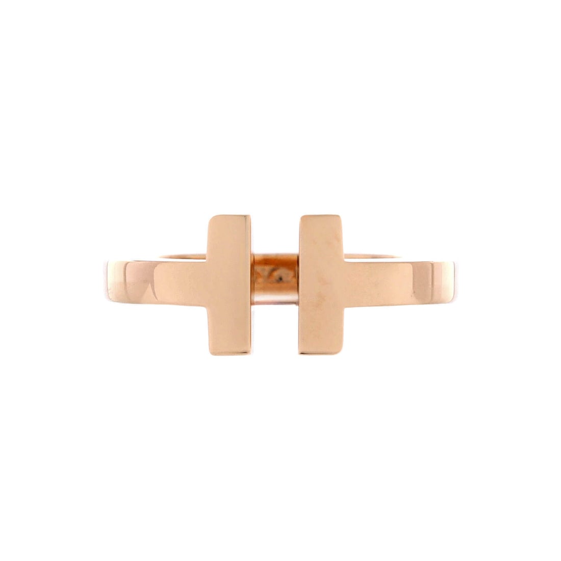 Tiffany & Co. T Square Ring 18K Rose Gold 4-47: Set in rose gold, the Tiffany & Co. T Square Ring pairs sculpted weight against a livable band. Worked in 18K Rose Gold. Mass-wise it lands in the comfortable mid-weight band that wears every day with