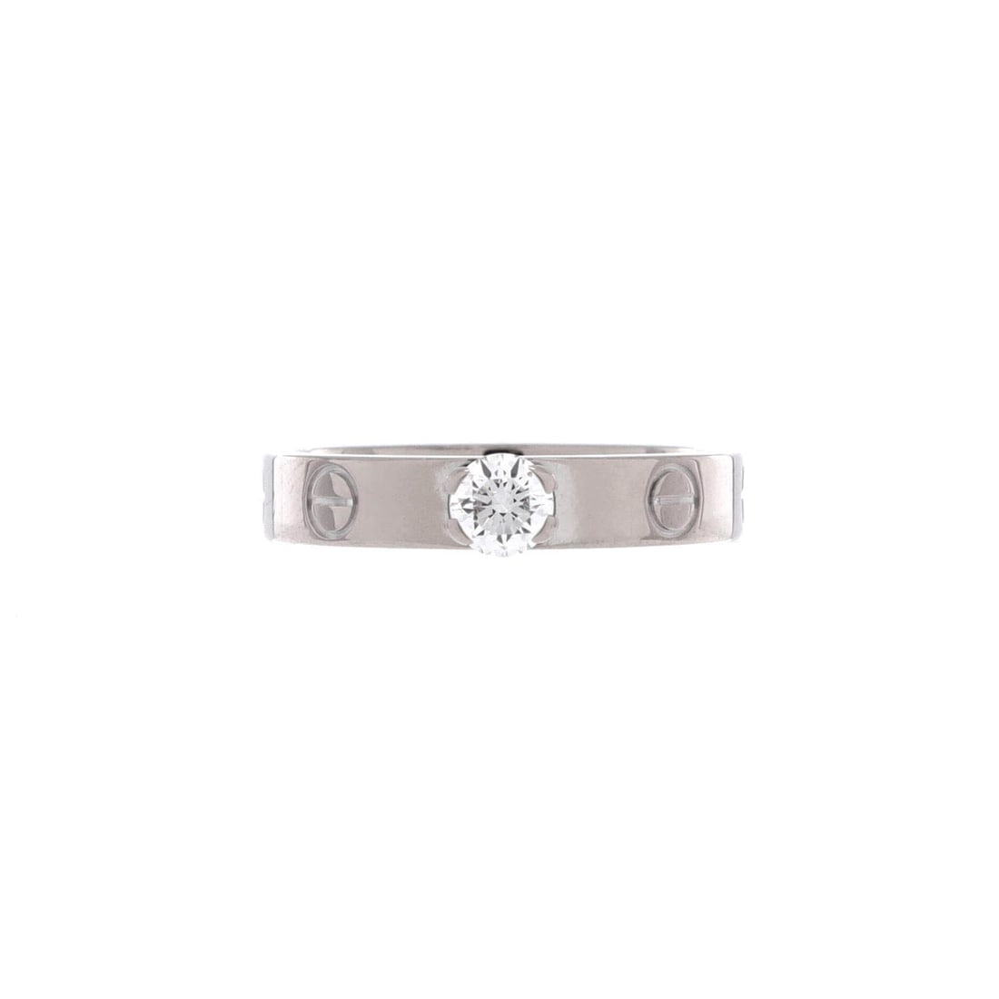 Cartier LOVE Solitaire Ring 18K White Gold with Diamond 0.23CT: Polished in white gold, the Cartier LOVE Solitaire Ring layers neatly with other house signatures. Worked in 18K White Gold with Diamond. Its finger-print reads sculptural rather than oversized, which