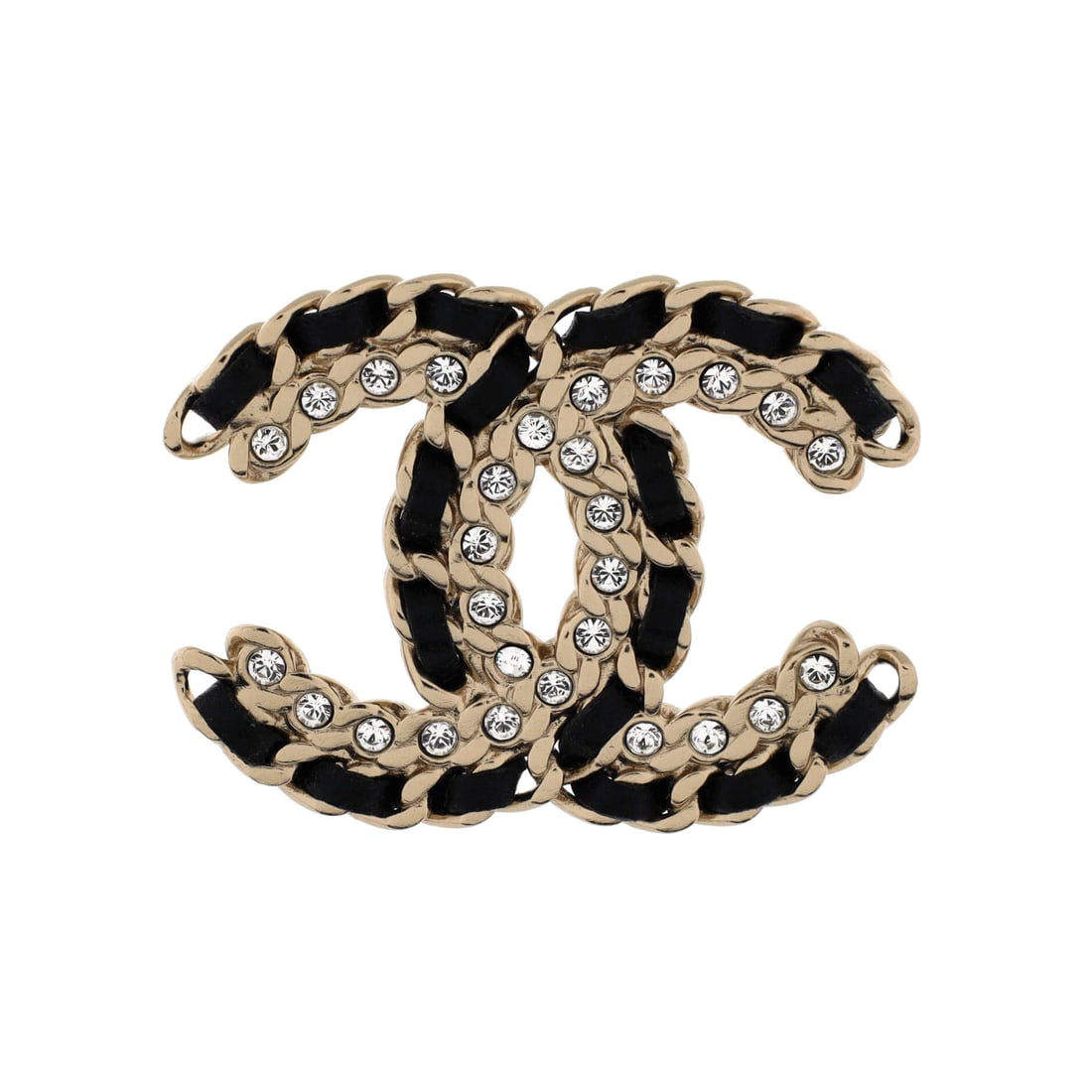 Chanel Vintage Allure Chain CC Brooch Metal with Lambskin and Crystal: Set in polished gold, the Chanel Vintage Allure Chain CC Brooch reads as both ornament and emblem on a jacket lapel. Worked in Metal with Lambskin and Crystal. Its scale reads deliberately compact, wh