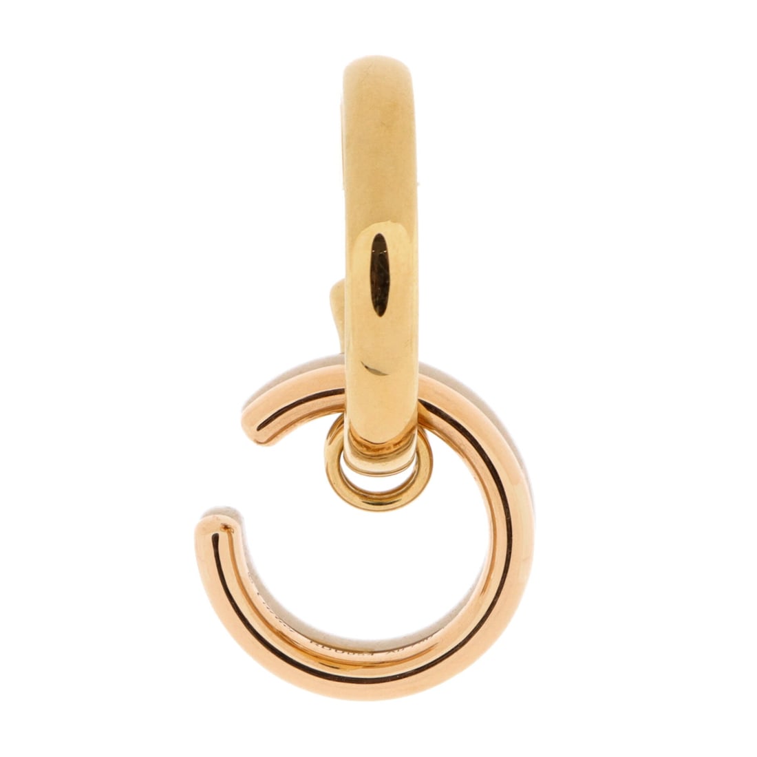 Cartier x Sacai Trinity Cuff Earring 18K Tricolor: Polished in tricolor gold, the Cartier x Sacai Trinity Cuff Earring balances brightness with measured restraint. Worked in 18K Tricolor. Sized at 1.5 by 3.55 inches, the proportion reads as deliberate