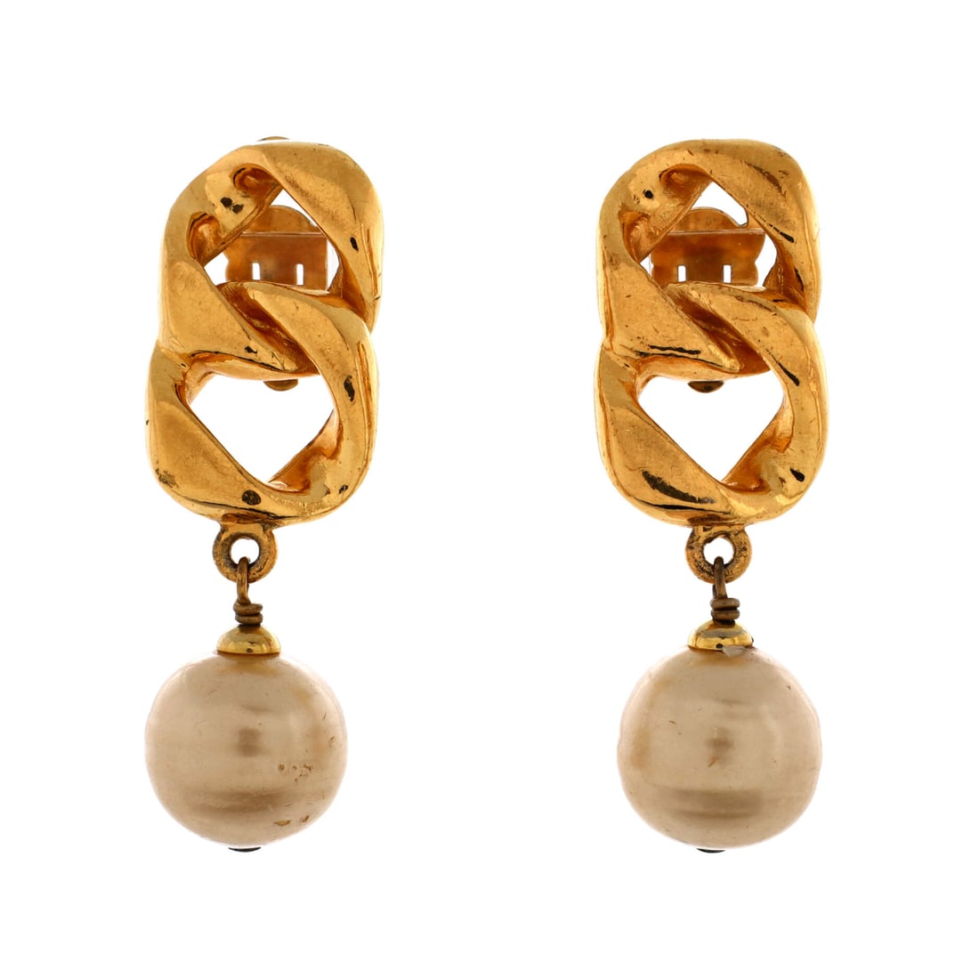 Chanel Chain Dangle Clip-On Earrings Metal with Faux Pearls: Hung in polished gold, the Chanel Chain Dangle Clip-On Earrings threads a discreetly captivating drop. Worked in Metal with Faux Pearls. Their scale gives them face-framing presence without the heft o
