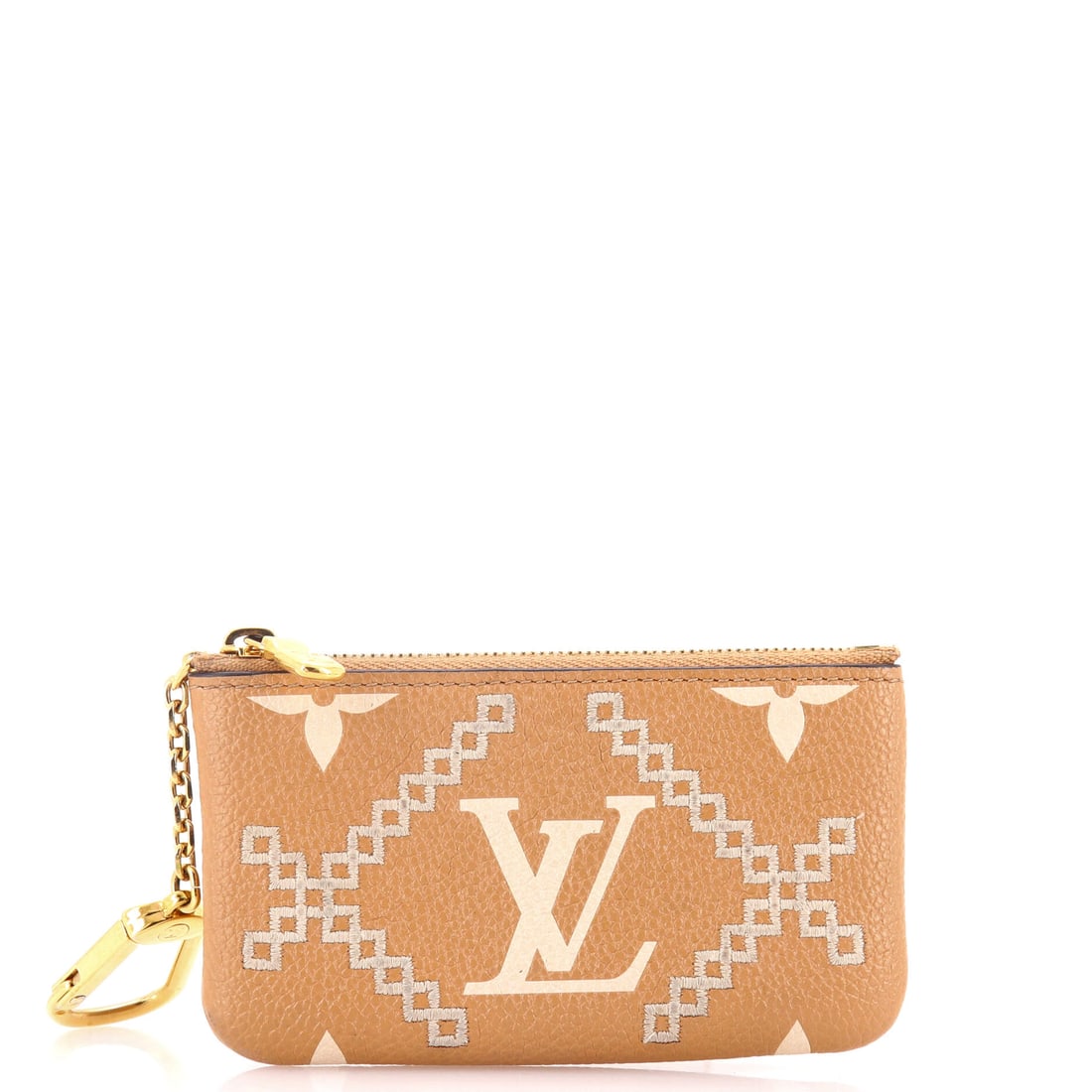 Louis Vuitton Key Pouch Monogram Empreinte Giant Broderies: Compact and clean, the Louis Vuitton Key Pouch reads as a small piece of architectural play. Worked in Monogram Empreinte Giant Broderies. Sized at 3 by 5 by 1 inches, the proportion reads as delibera