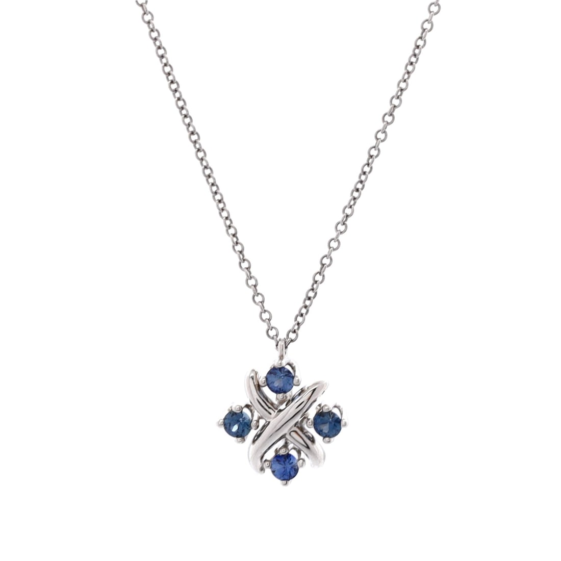 Tiffany & Co. Schlumberger Lynn Pendant Necklace Platinum with Blue Sapphires: Crisply drawn, the Tiffany & Co. Schlumberger Lynn Pendant Necklace sits with elegant intent against the collarbone. Worked in Platinum with Blue Sapphires. Scale-wise it lives in the sweet spot betwe