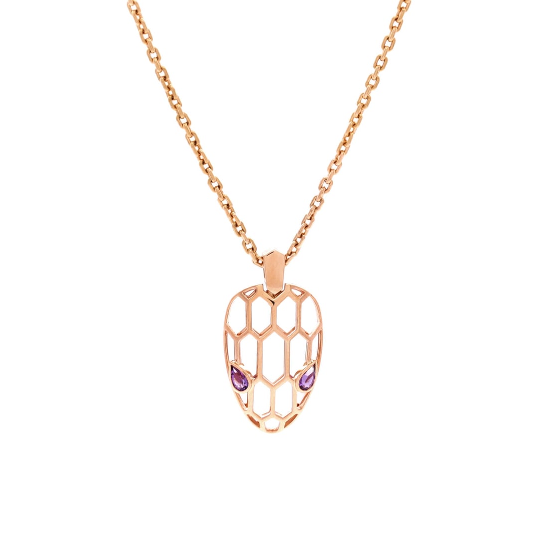 Bvlgari Serpenti Seduttori Pendant Necklace 18K Rose Gold with Amethyst: Quietly composed, the Bvlgari Serpenti Seduttori Pendant Necklace keeps its silhouette spare and its presence assured. Worked in 18K Rose Gold with Amethyst. Scale-wise it lives in the sweet spot betw