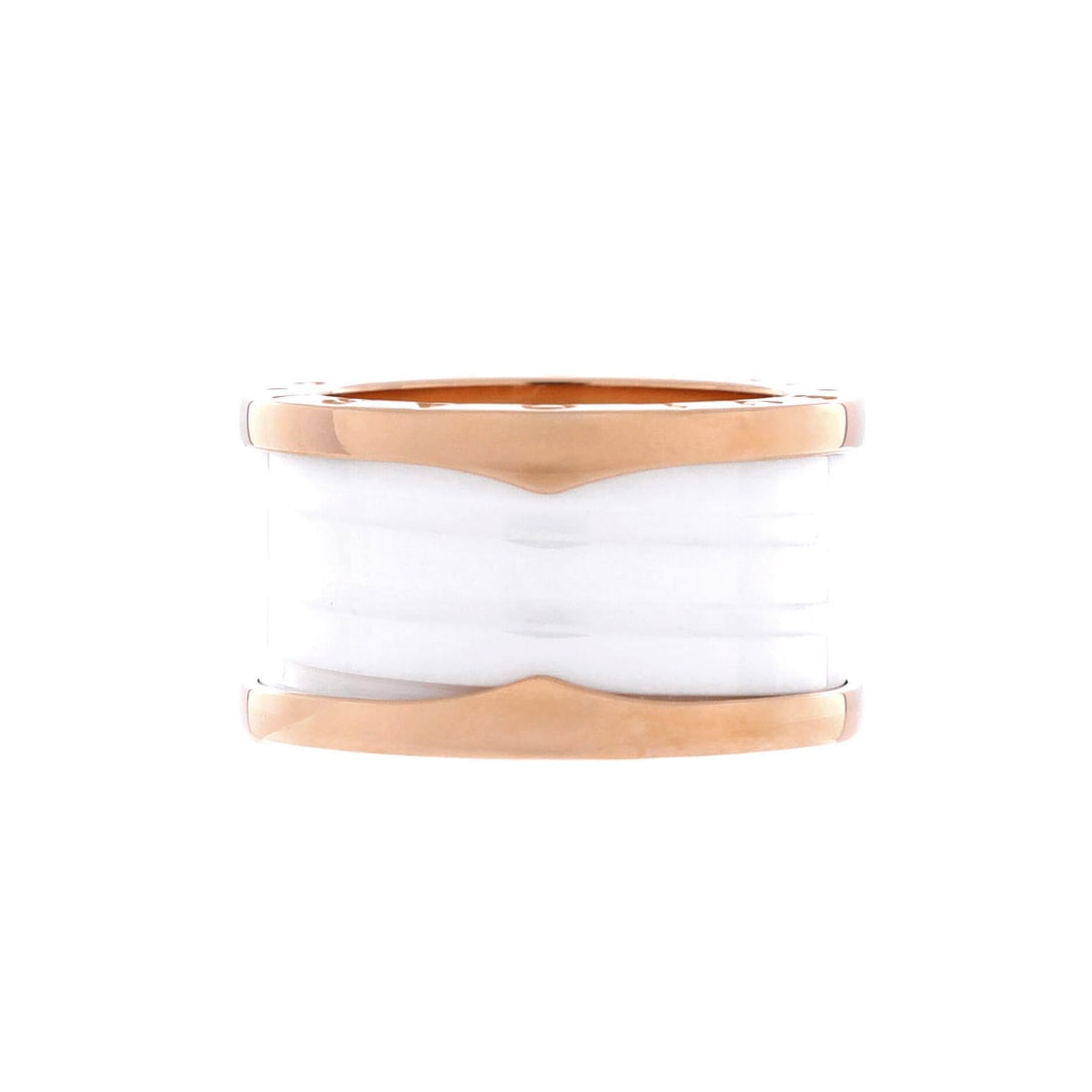 Bvlgari B.Zero1 Four Band Ring 18K Rose Gold and Ceramic 6-52: Crisply finished, the Bvlgari B.Zero1 Four Band Ring stays balanced through every angle of the hand. Worked in 18K Rose Gold and Ceramic. Its finger-print reads sculptural rather than oversized, which