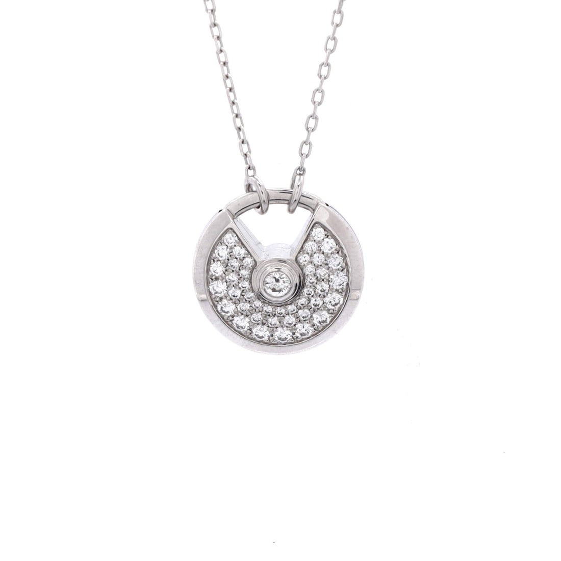 Cartier Amulette de Cartier Pendant Necklace 18K White Gold and Pave Diamonds Small: Rendered in white gold, the Cartier Amulette de Cartier Pendant Necklace reads with the kind of clean line that holds attention without raising its voice. Worked in 18K White Gold and Pave Diamonds. T