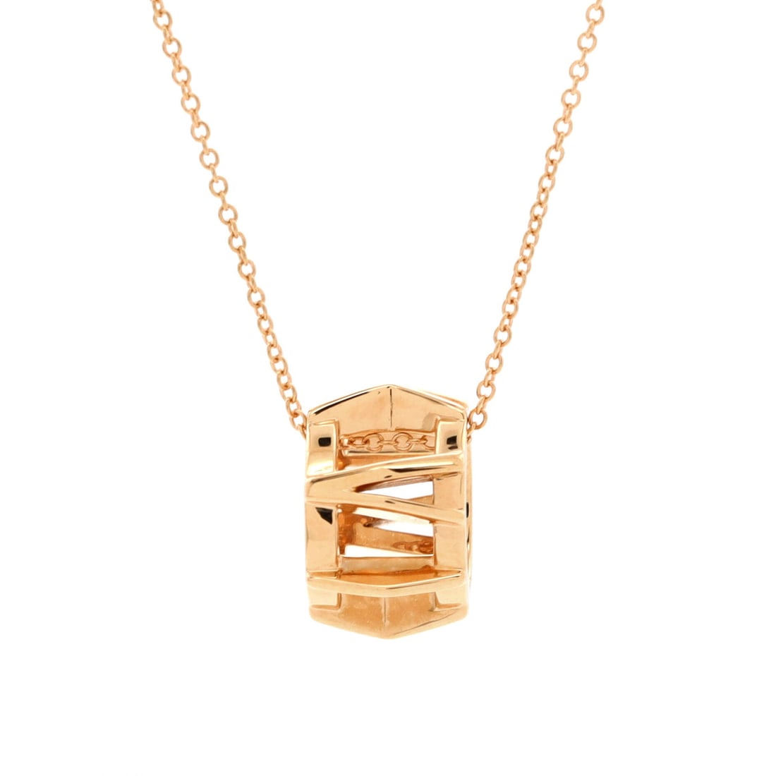 Tiffany & Co. Atlas X Open Pendant Necklace 18K Rose Gold: Rendered in rose gold, the Tiffany & Co. Atlas X Open Pendant Necklace reads as both ornament and quiet emblem. Worked in 18K Rose Gold. The chain length reads as classic mid-collar, where a piece ann