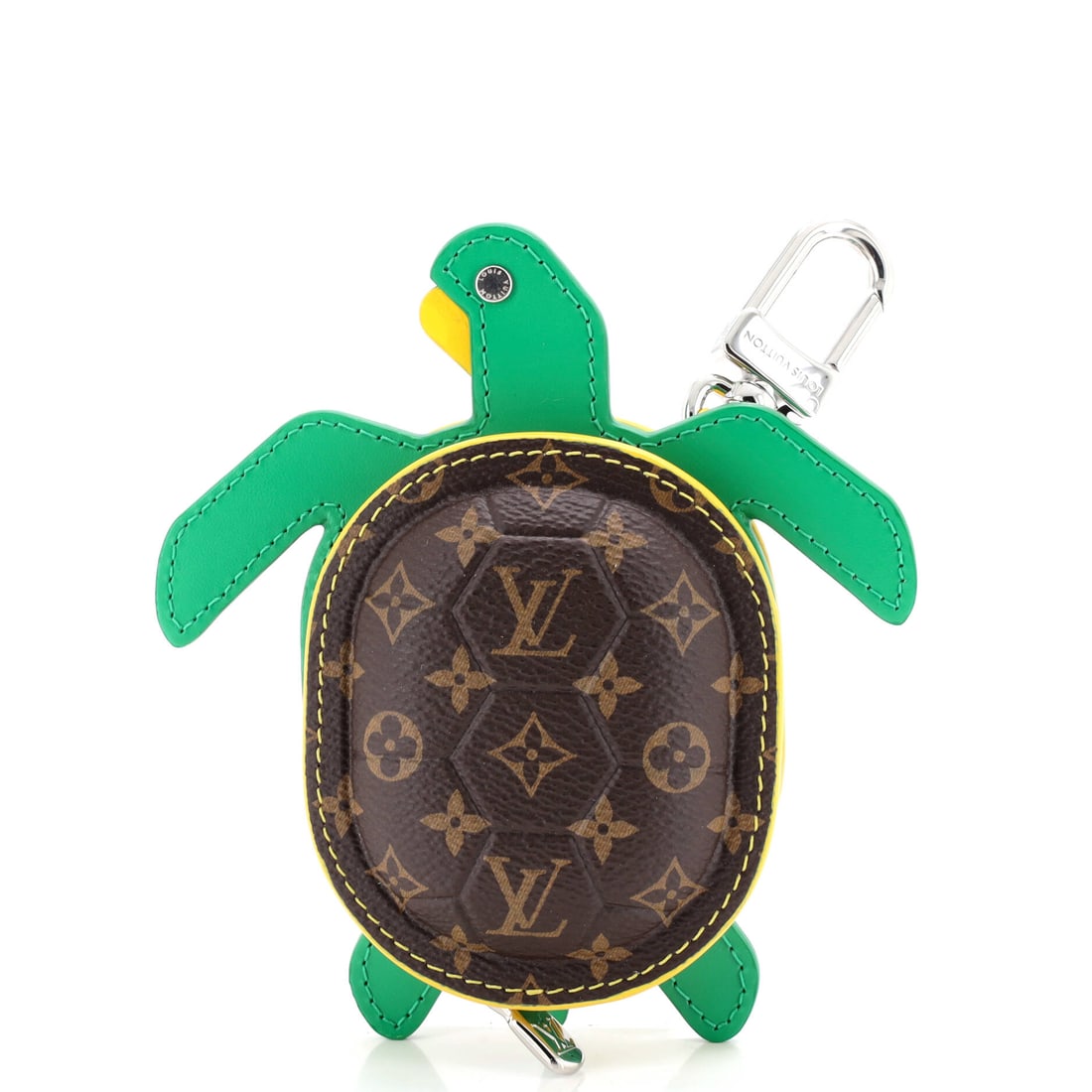 Louis Vuitton Turtle Pouch Bag Charm Monogram Canvas with Leather: Built as a charm, the Louis Vuitton Turtle Pouch Bag Charm carries house code into a single hooked detail. Worked in Monogram Canvas with Leather. Its scale reads deliberately compact, which is exactl