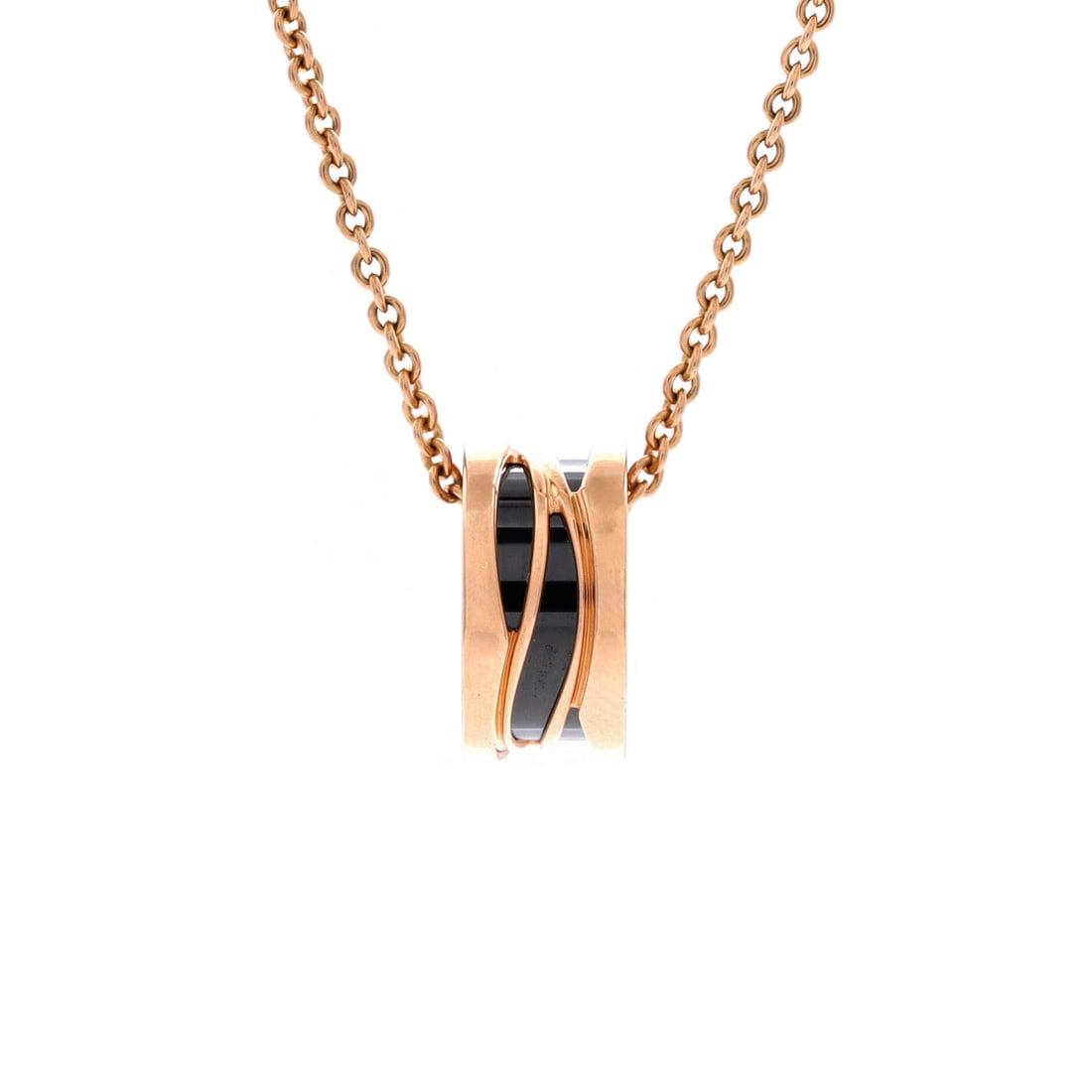 Bvlgari B.Zero1 Design Legend Zaha Hadid Pendant Necklace 18K Rose Gold with Ceramic: Anchored in poise, the Bvlgari B.Zero1 Design Legend Zaha Hadid Pendant Necklace sits exactly where a thoughtful piece is meant to land. Worked in 18K Rose Gold with Ceramic. The drop sits exactly at 