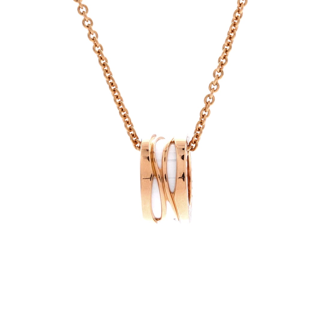 Bvlgari B.Zero1 Design Legend Zaha Hadid Pendant Necklace 18K Rose Gold with Ceramic: Anchored in rose gold, the Bvlgari B.Zero1 Design Legend Zaha Hadid Pendant Necklace layers chain and ornament with deliberate restraint. Worked in 18K Rose Gold with Ceramic. The drop sits exactly at