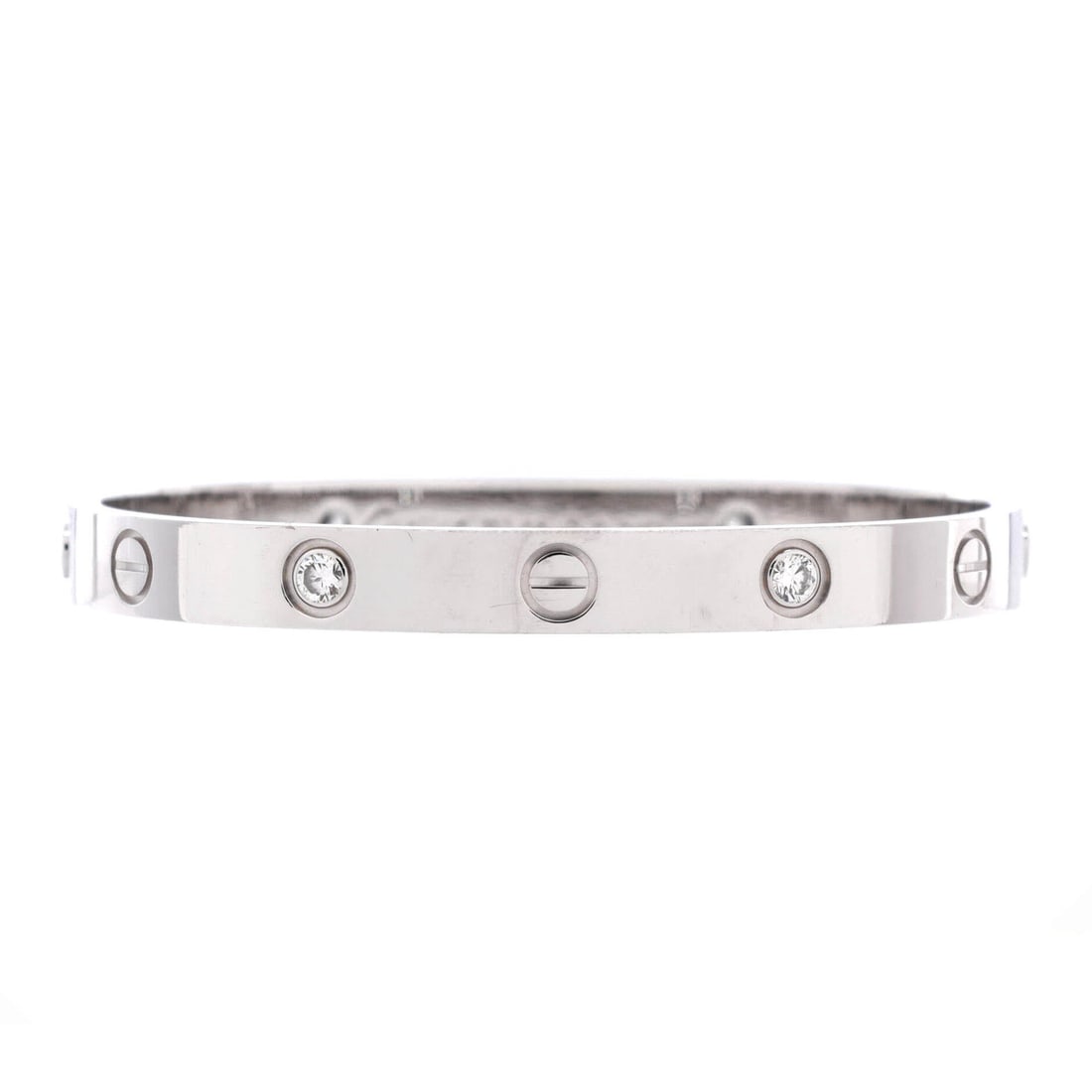 Cartier Love 4 Diamond Bracelet 18K White Gold and Diamonds: Stack-ready, the Cartier Love 4 Diamond Bracelet sits as low-profile as it does deliberate. Worked in 18K White Gold and Diamonds. The articulation traces the wrist closely, so it lays flat rather tha