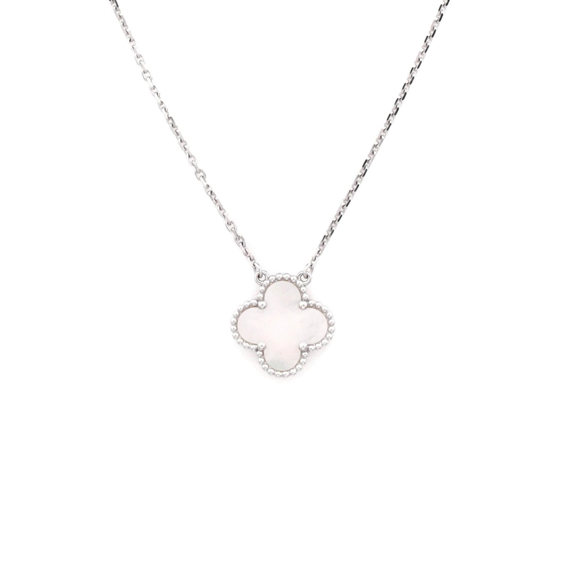 Van Cleef & Arpels Vintage Alhambra Pendant Necklace 18K White Gold and Mother of Pearl: Quietly composed, the Van Cleef & Arpels Vintage Alhambra Pendant Necklace sits exactly where a thoughtful piece is meant to land. Worked in 18K White Gold and Mother of Pearl. The chain length reads 