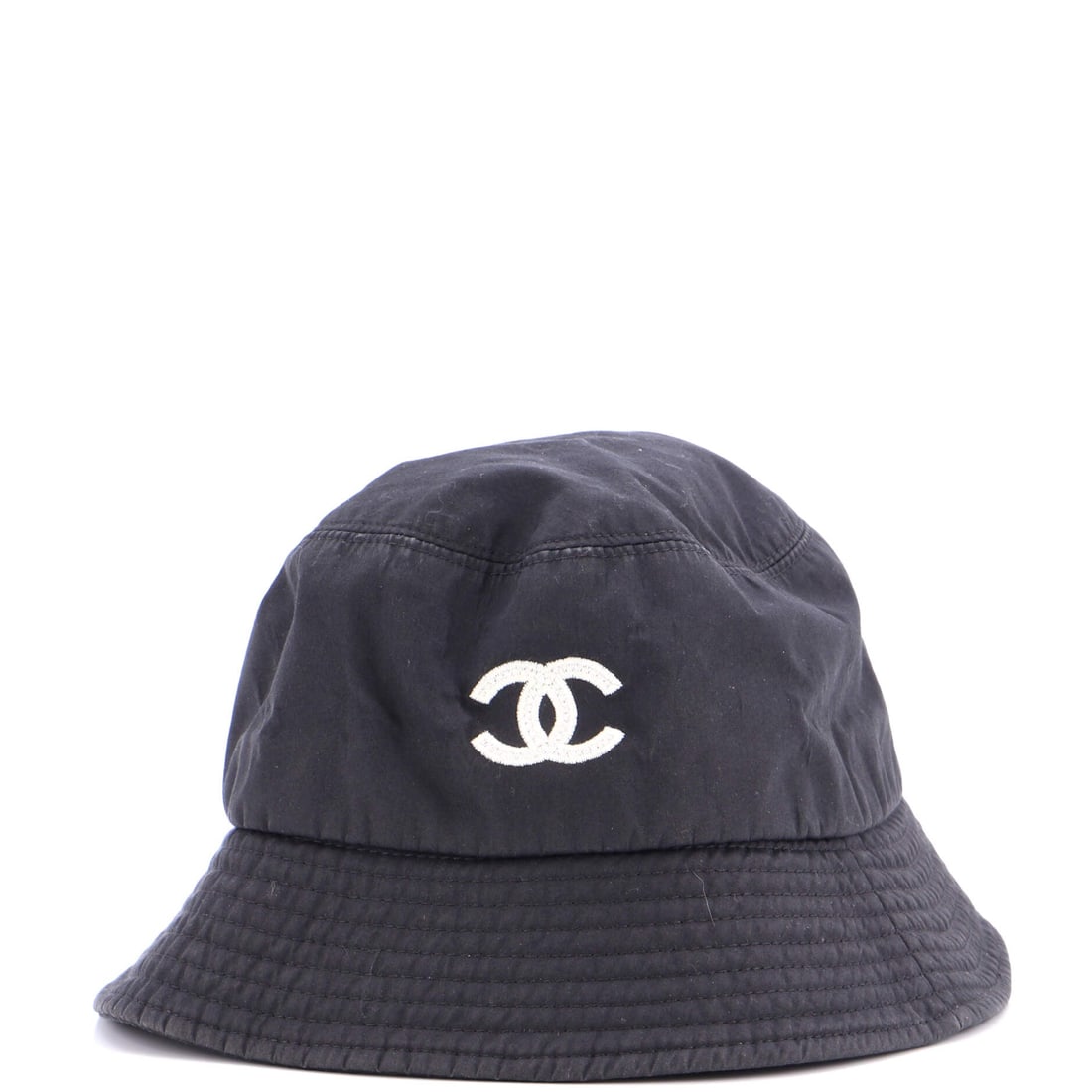 Chanel CC Bucket Hat Cotton: Chignon-tuned, the Chanel CC Bucket Hat finishes a look with house-trained confidence. Worked in Cotton. Its scale reads deliberately compact, which is exactly what makes it pair so easily with other 