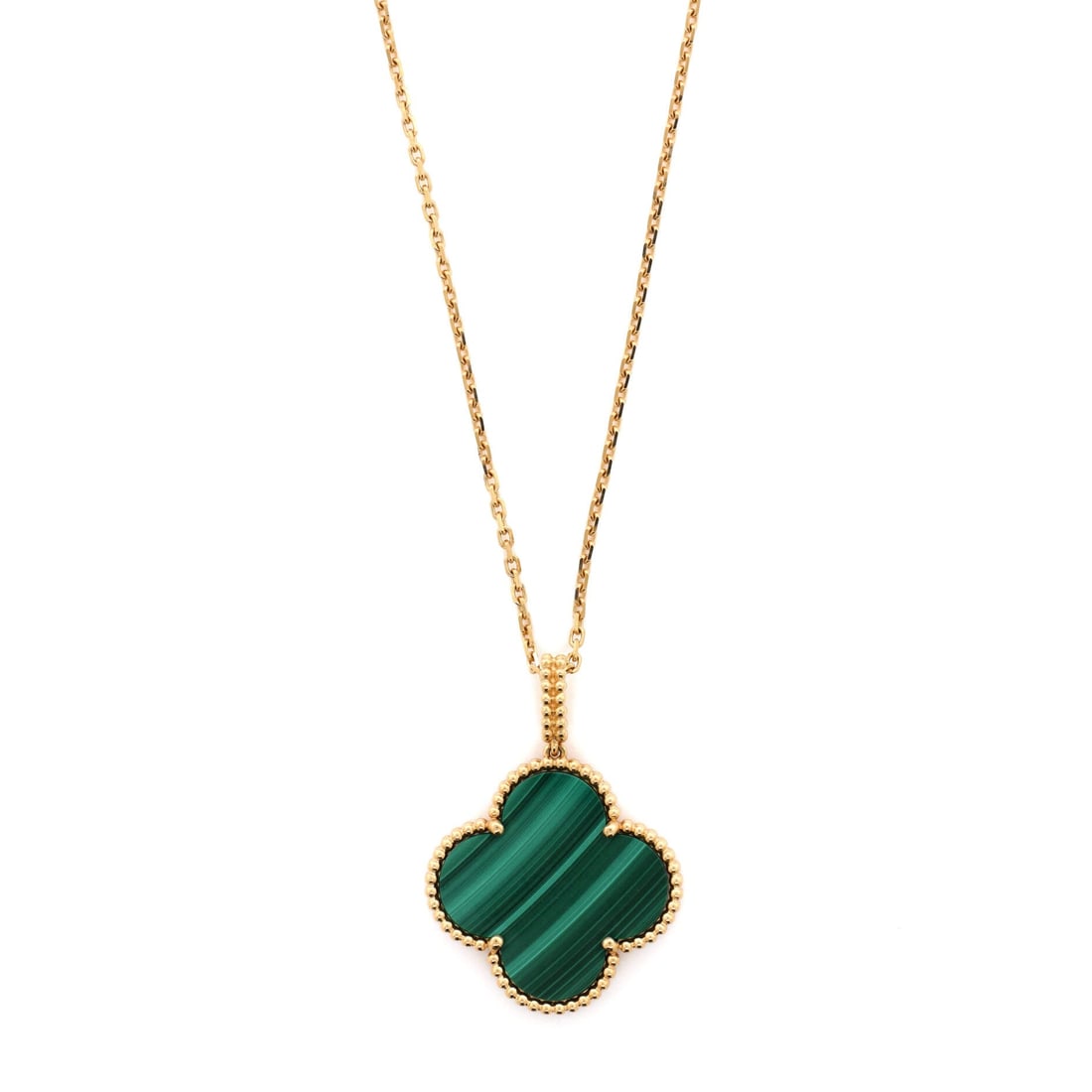 Van Cleef & Arpels Magic Alhambra Pendant Necklace 18K Yellow Gold and Malachite: Tuned to wear, the Van Cleef & Arpels Magic Alhambra Pendant Necklace reads as both ornament and quiet emblem. Worked in 18K Yellow Gold and Malachite. Its proportions slip cleanly under a collar yet 