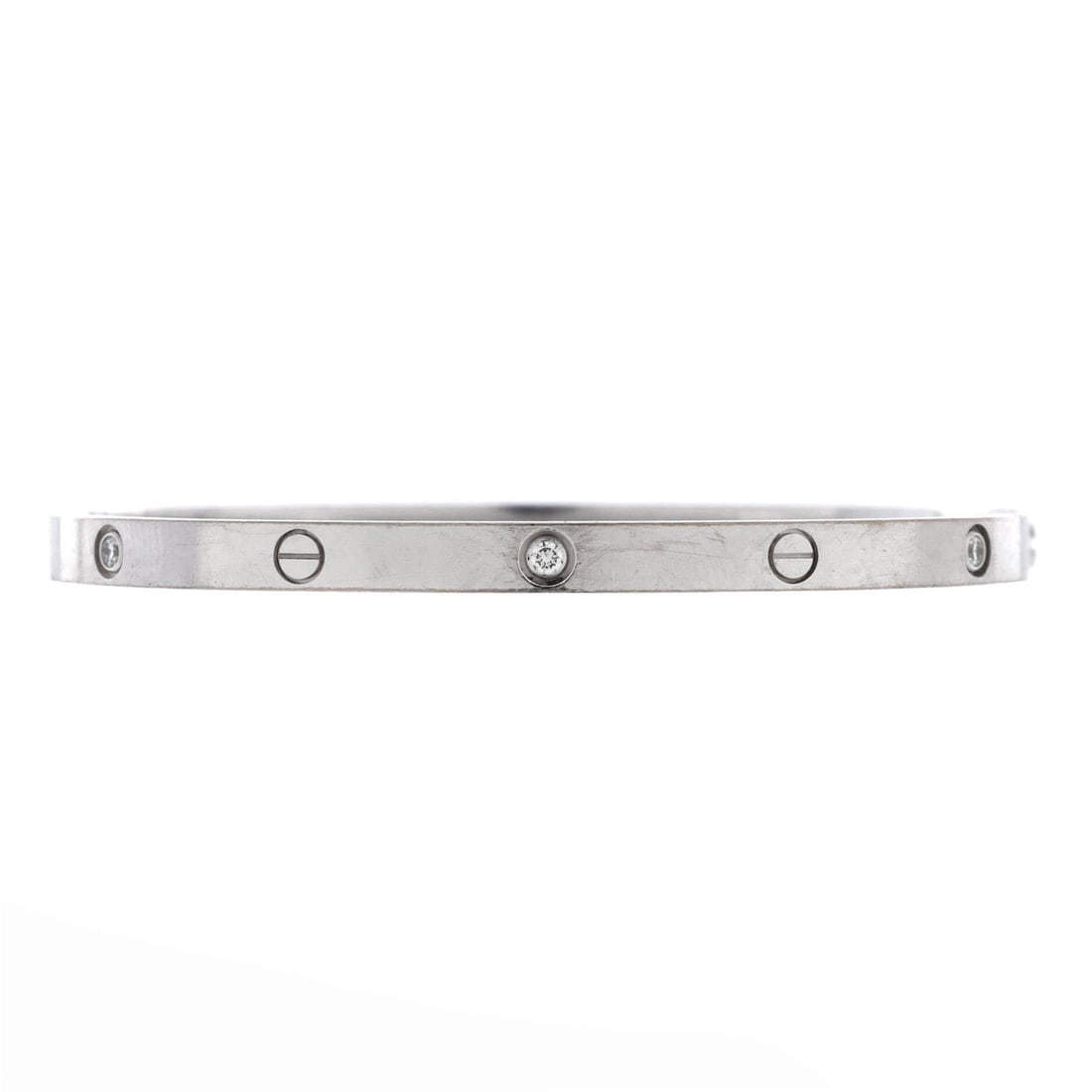 Cartier Love 6 Diamond Bracelet 18K White Gold and Diamonds Small: Cast in white gold, the Cartier Love 6 Diamond Bracelet holds its line with the disciplined geometry of a house signature. Worked in 18K White Gold and Diamonds. Its band proportion reads as substanti
