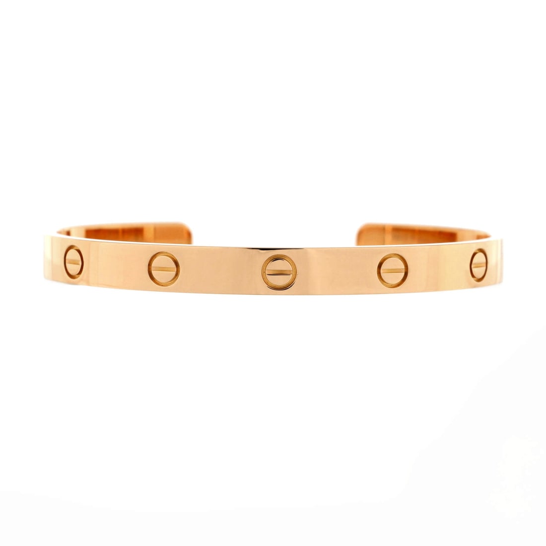 Cartier Love Cuff Bracelet 18K Rose Gold: Built to wear, the Cartier Love Cuff Bracelet curves around the wrist scaled for daily wear without losing its presence. Worked in 18K Rose Gold. The articulation traces the wrist closely, so it lays 