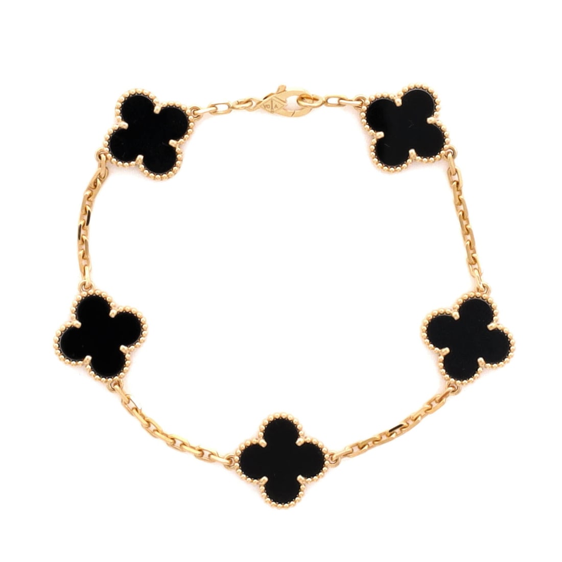 Van Cleef & Arpels Vintage Alhambra 5 Motifs Bracelet 18K Yellow Gold and Onyx: Sculpted in yellow gold, the Van Cleef & Arpels Vintage Alhambra 5 Motifs Bracelet reads as a daily-wear classic. Worked in 18K Yellow Gold and Onyx. The wrist fit is tuned for daily wear, easy to sli