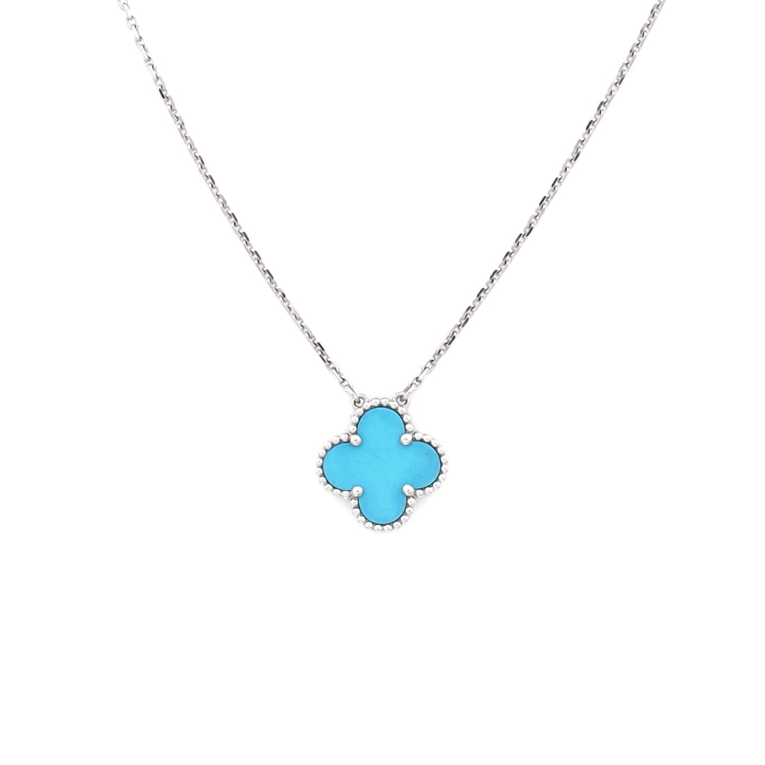 Van Cleef & Arpels Vintage Alhambra Pendant Necklace 18K White Gold and Turquoise: Editorial-calm, the Van Cleef & Arpels Vintage Alhambra Pendant Necklace reads with the kind of clean line that holds attention without raising its voice. Worked in 18K White Gold and Turquoise. The c