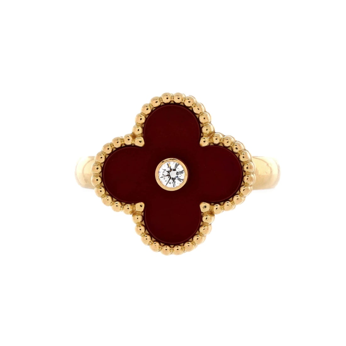 Van Cleef & Arpels Vintage Alhambra Ring 18K Yellow Gold with Carnelian and Diamond 4.75-49: Sculpted to wear, the Van Cleef & Arpels Vintage Alhambra Ring reads sculptural rather than oversized. Worked in 18K Yellow Gold with Carnelian and Diamond. Its finger-print reads sculptural rather th