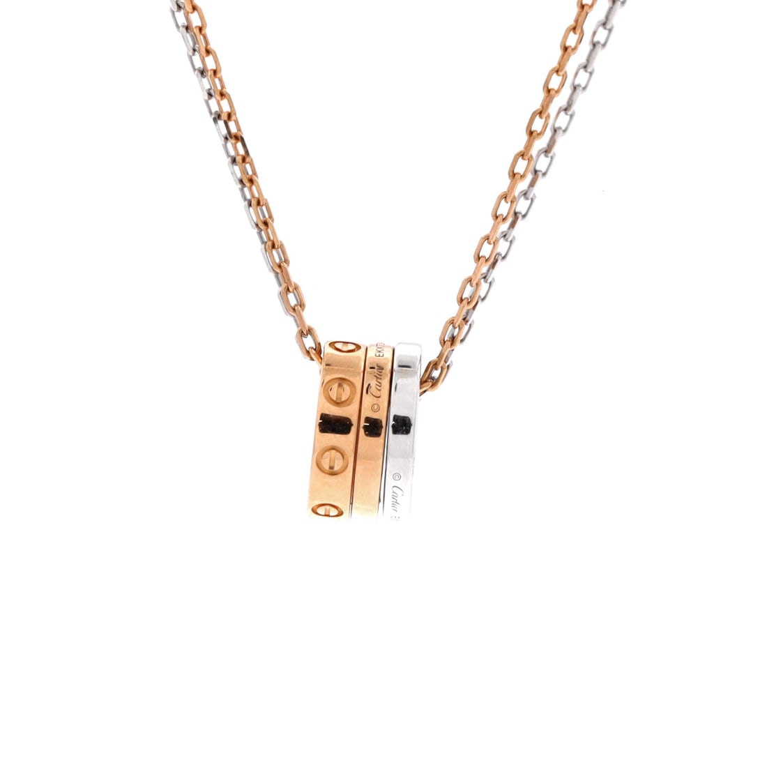 Cartier Love 3 Ring Pendant Necklace 18K Rose Gold and 18K White Gold with 6 Diamonds: Threaded in rose and white gold, the Cartier Love 3 Ring Pendant Necklace carries its motif with quiet authority. Worked in 18K Rose Gold and 18K White Gold with 6 Diamonds. Scale-wise it lives in the
