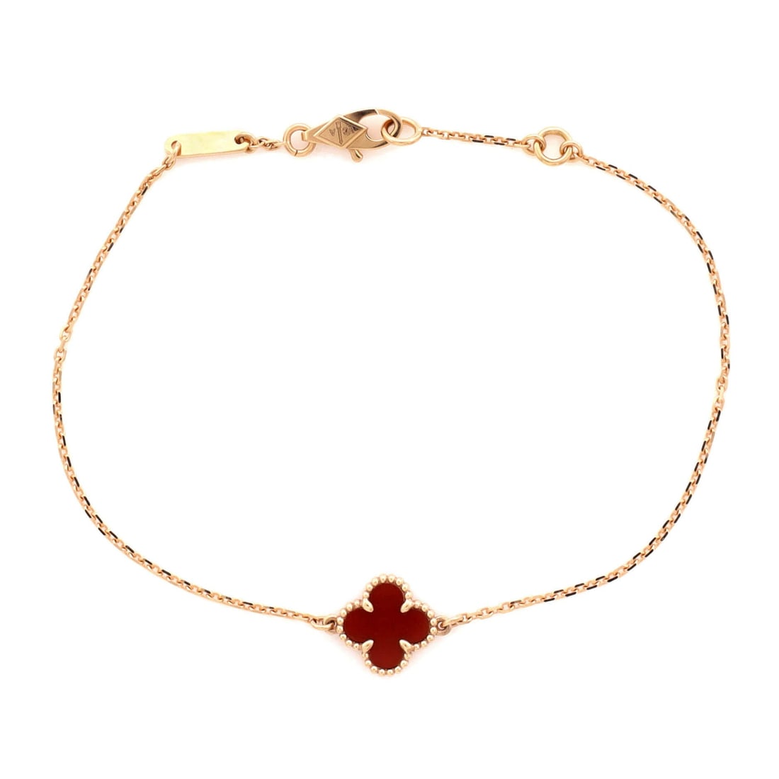 Van Cleef & Arpels Sweet Alhambra Bracelet 18K Rose Gold and Carnelian: Wrist-tuned, the Van Cleef & Arpels Sweet Alhambra Bracelet holds its line with the disciplined geometry of a house signature. Worked in 18K Rose Gold and Carnelian. Its band proportion reads as subst