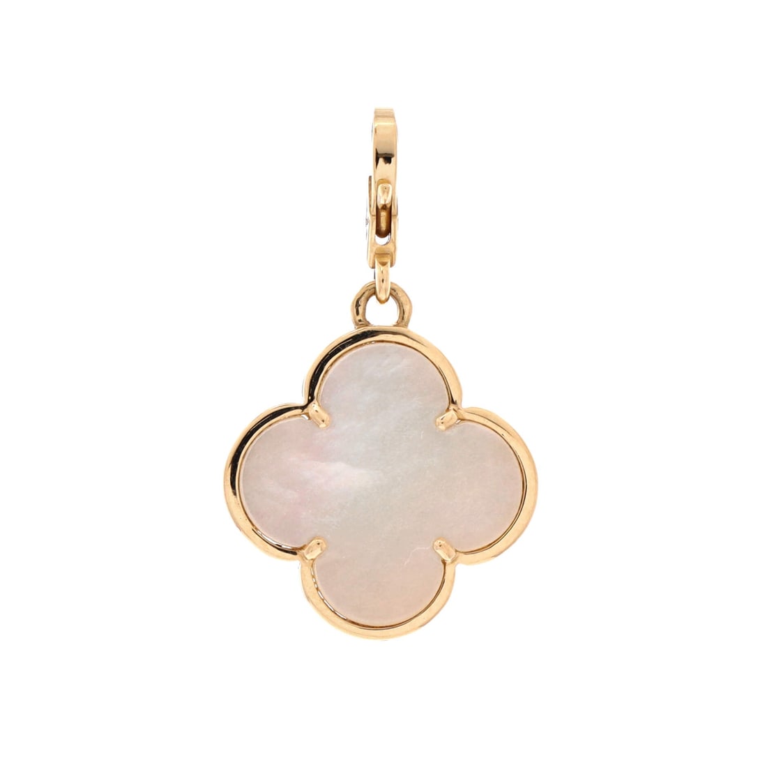 Van Cleef & Arpels Magic Alhambra Pendant Charm 18K Yellow Gold and Mother of Pearl: Set in yellow gold, the Van Cleef & Arpels Magic Alhambra Pendant Charm suspends its centerpiece with measured grace on a clean run of chain. Worked in 18K Yellow Gold and Mother of Pearl. Sized at 1.