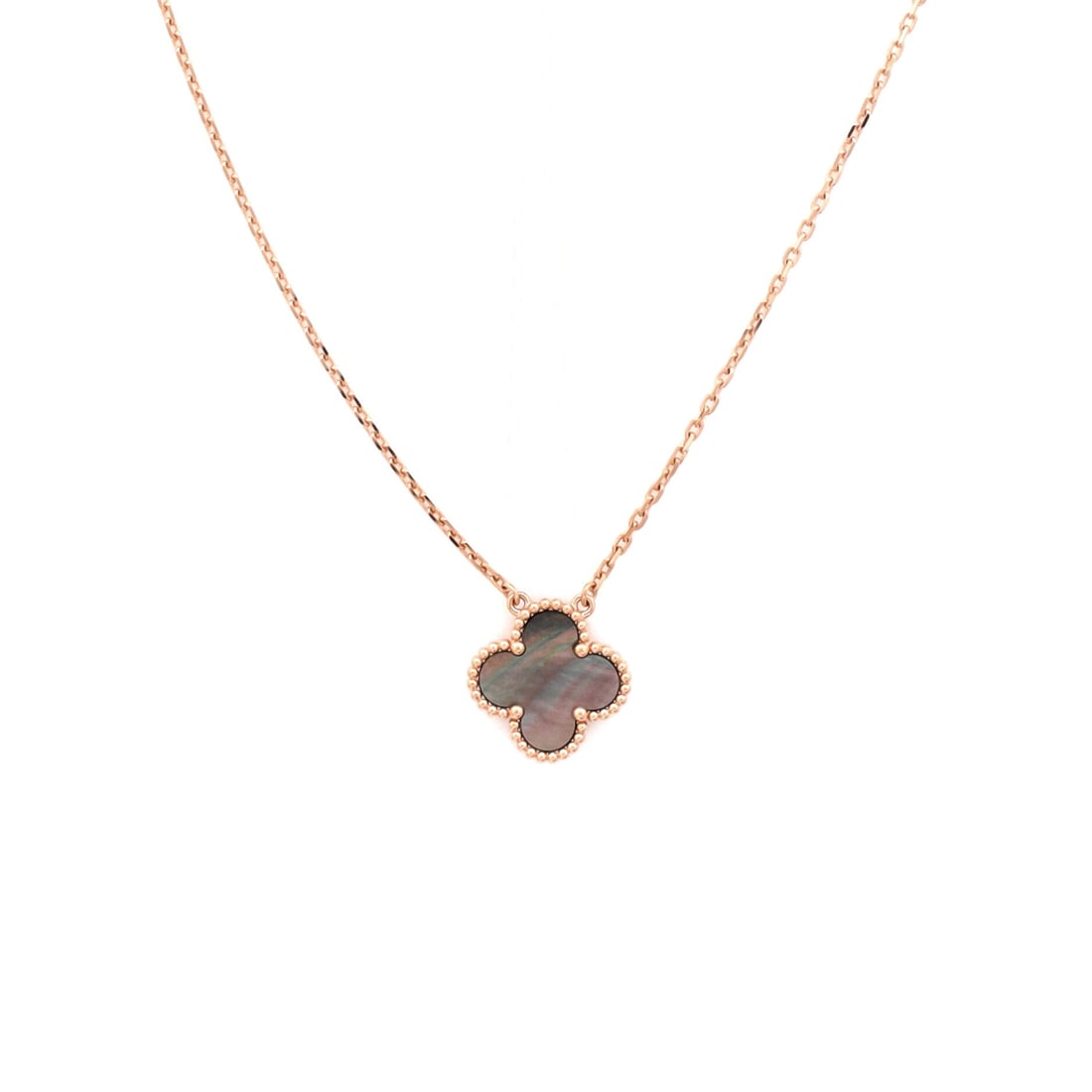 Van Cleef & Arpels Vintage Alhambra Pendant Necklace 18K Rose Gold and Grey Mother of Pearl: Quietly composed, the Van Cleef & Arpels Vintage Alhambra Pendant Necklace sits exactly where a thoughtful piece is meant to land. Worked in 18K Rose Gold and Grey Mother of Pearl. The chain length re