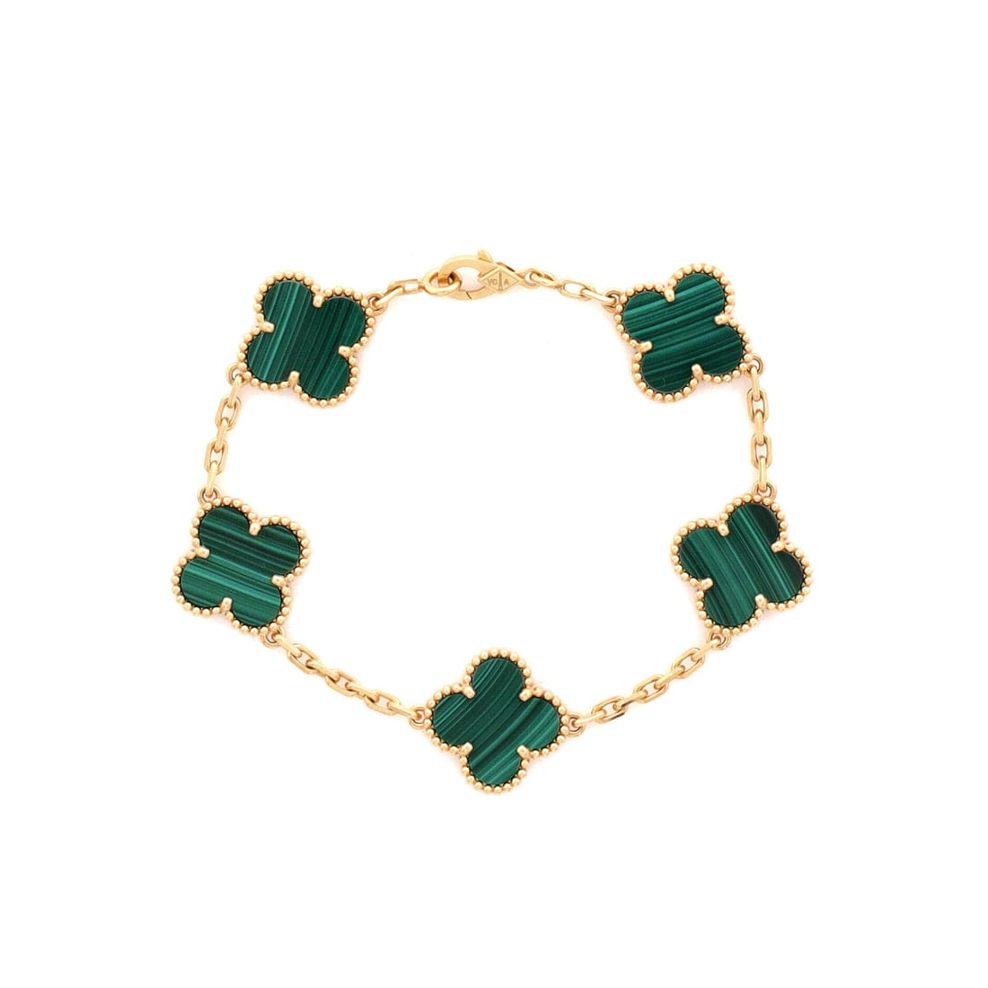Van Cleef & Arpels Vintage Alhambra 5 Motifs Bracelet 18K Yellow Gold and Malachite: Sculpted in yellow gold, the Van Cleef & Arpels Vintage Alhambra 5 Motifs Bracelet reads as both structural and feminine. Worked in 18K Yellow Gold and Malachite. The wrist fit is tuned for daily wear