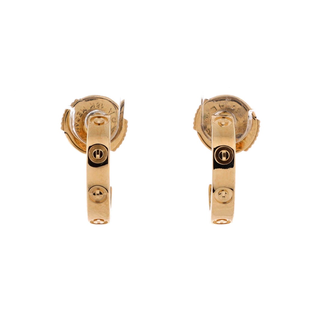 Cartier Love Hoop Earrings 18K Yellow Gold Small: Set in yellow gold, the Cartier Love Hoop Earrings pulls focus without crowding the neckline. Worked in 18K Yellow Gold. Sized at 12.6 by 2.65 inches, the proportion reads as deliberate without being 