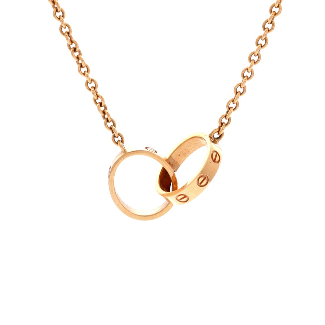 Cartier Love Interlocking Necklace 18K Rose Gold: Tuned to wear, the Cartier Love Interlocking Necklace reads as both ornament and quiet emblem. Worked in 18K Rose Gold. The drop sits exactly at the spot a thoughtful piece is meant to land - long eno