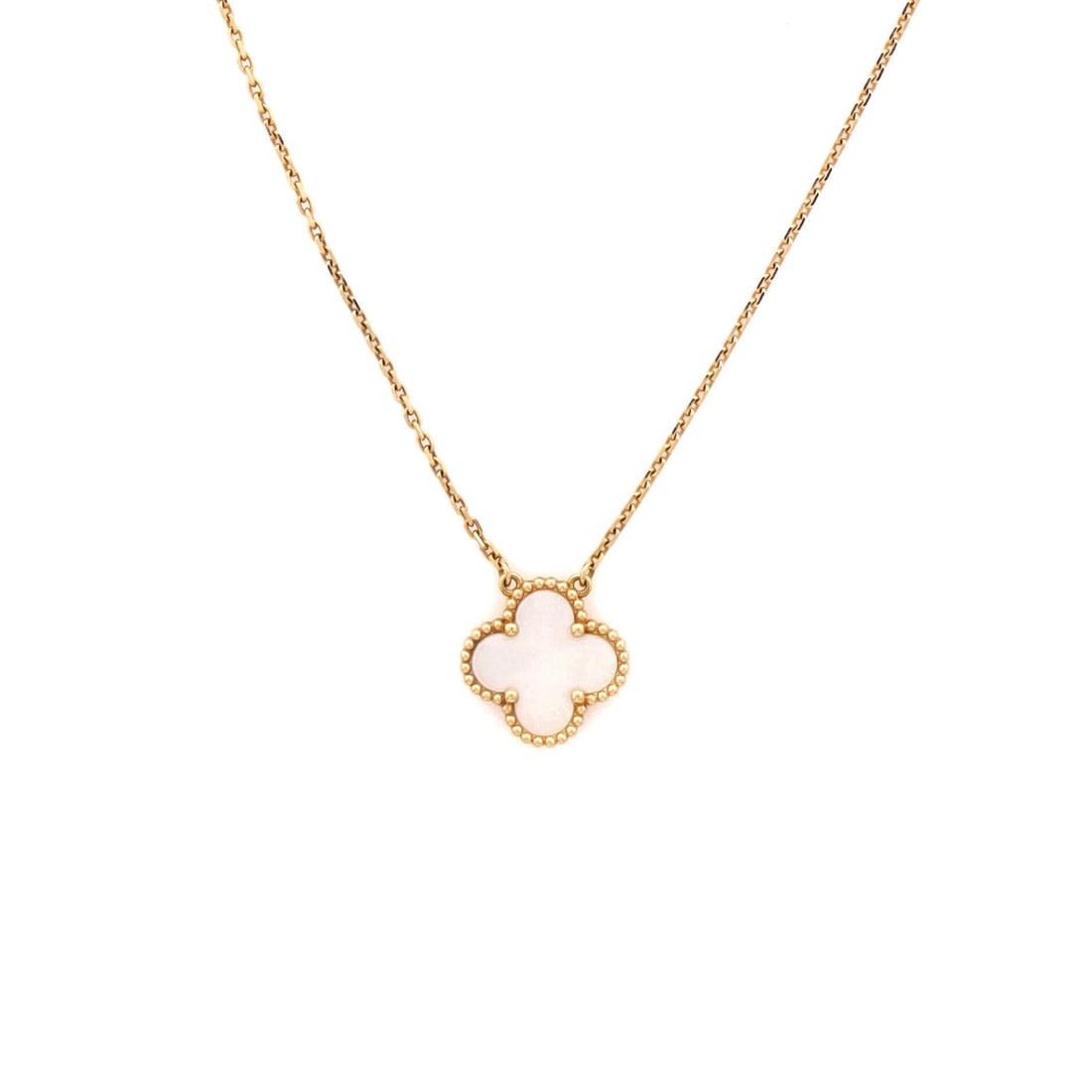 Van Cleef & Arpels Vintage Alhambra Pendant Necklace 18K Yellow Gold and Mother of Pearl: Layered to wear, the Van Cleef & Arpels Vintage Alhambra Pendant Necklace reads with the kind of clean line that holds attention without raising its voice. Worked in 18K Yellow Gold and Mother of Pear