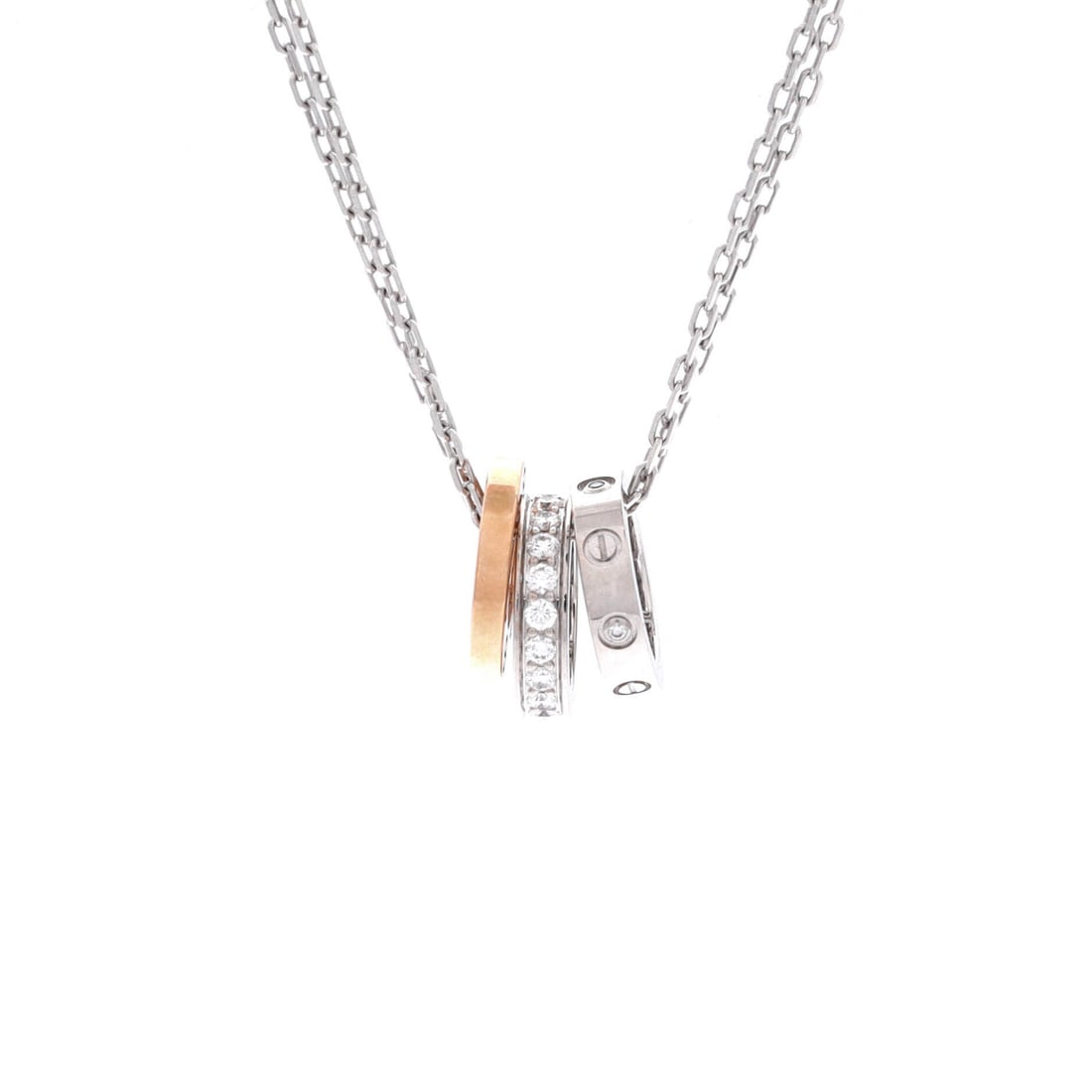 Cartier Love 3 Ring Pendant Necklace 18K Rose Gold and 18K White Gold with Diamonds: Threaded in rose and white gold, the Cartier Love 3 Ring Pendant Necklace carries its motif with quiet authority. Worked in 18K Rose Gold and 18K White Gold with Diamonds. Scale-wise it lives in the s