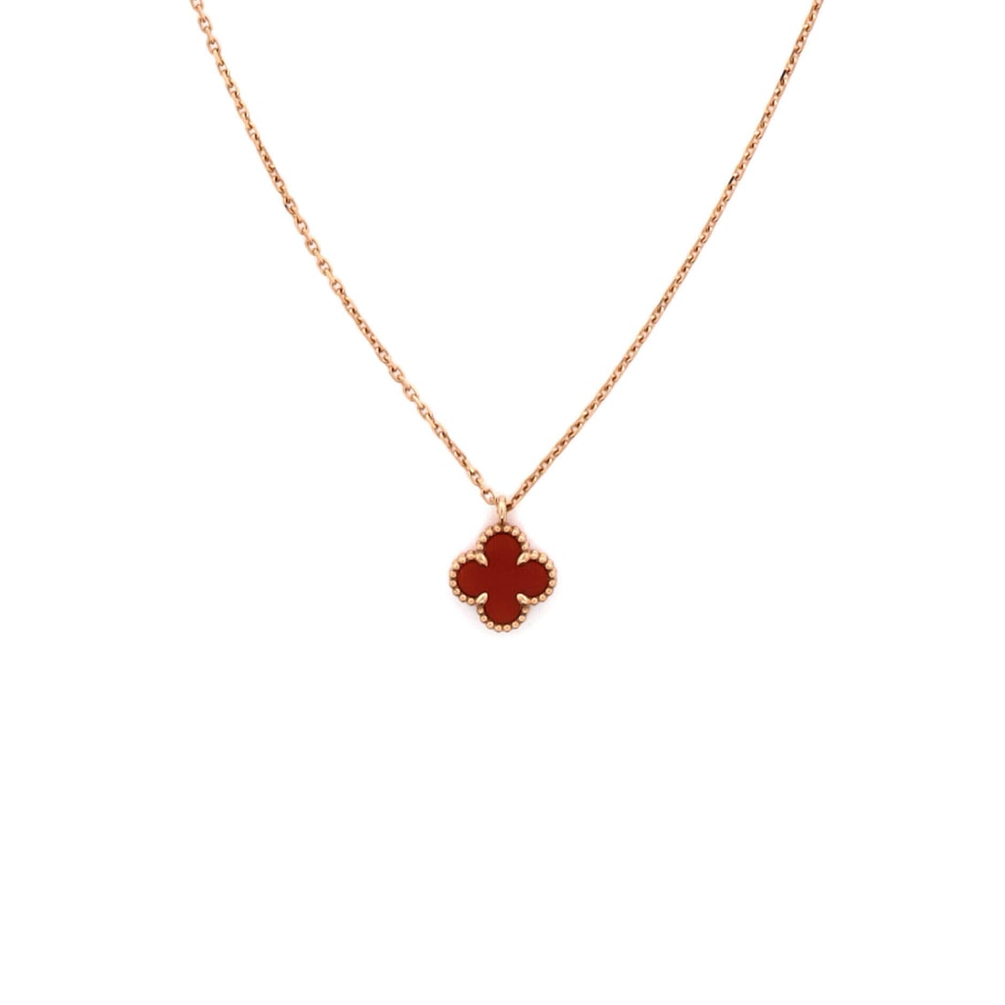 Van Cleef & Arpels Sweet Alhambra Pendant Necklace 18K Rose Gold and Carnelian: Rendered in rose gold, the Van Cleef & Arpels Sweet Alhambra Pendant Necklace layers chain and ornament with deliberate restraint. Worked in 18K Rose Gold and Carnelian. Scale-wise it lives in the swe