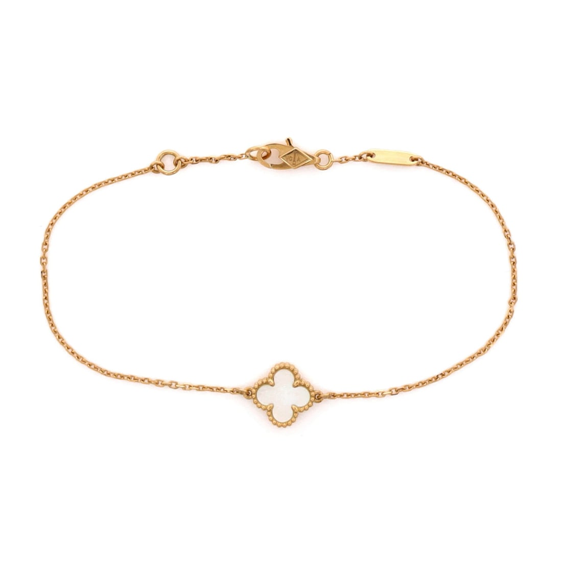 Van Cleef & Arpels Sweet Alhambra Bracelet 18K Yellow Gold and Mother of Pearl: Crisply joined, the Van Cleef & Arpels Sweet Alhambra Bracelet curves around the wrist scaled for daily wear without losing its presence. Worked in 18K Yellow Gold and Mother of Pearl. The articulatio