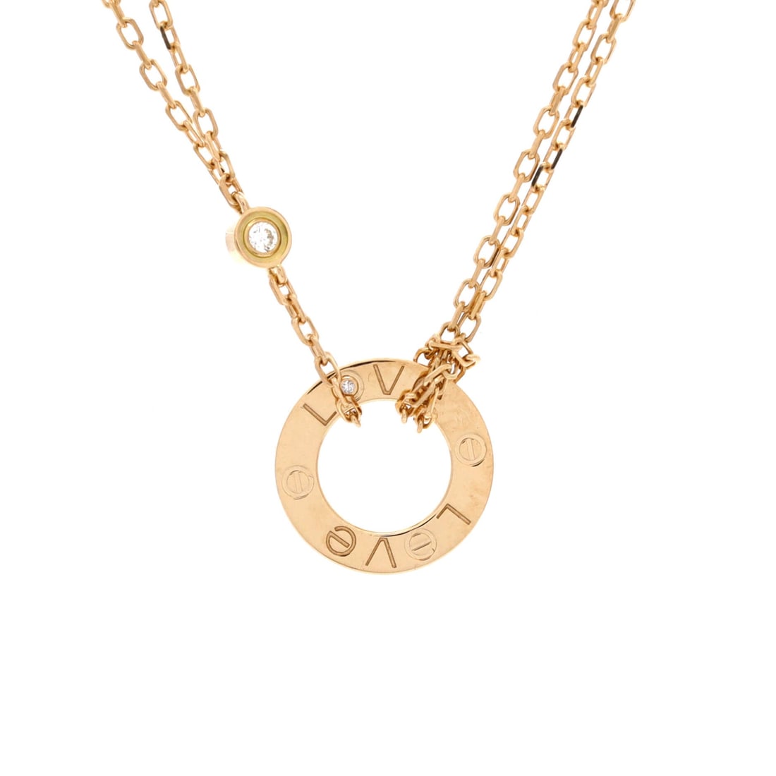 Cartier 2 Diamonds Love Pendant Necklace 18K Yellow Gold and Diamonds: Linked with care, the Cartier 2 Diamonds Love Pendant Necklace sits with elegant intent against the collarbone. Worked in 18K Yellow Gold and Diamonds. The chain length reads as classic mid-collar, wh