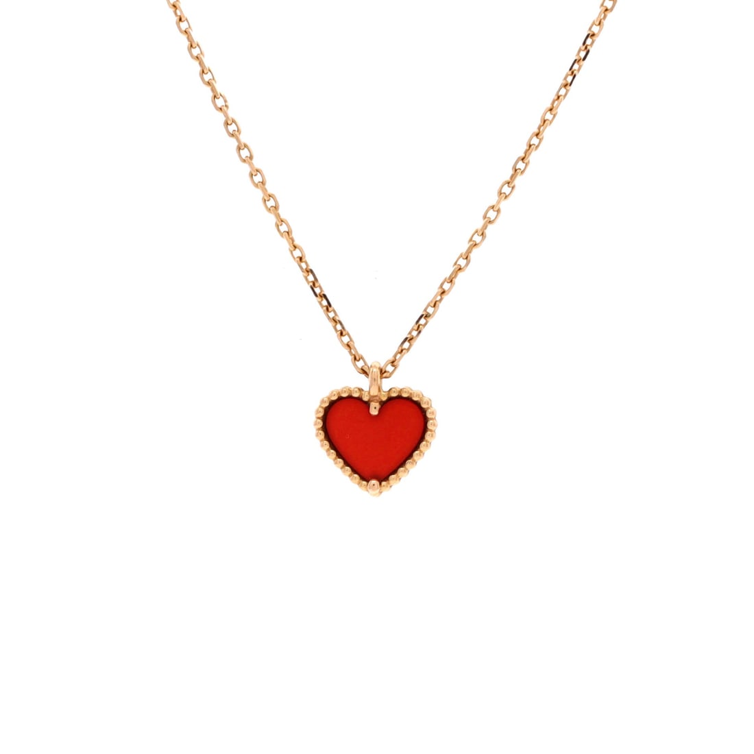 Van Cleef & Arpels Sweet Alhambra Heart Pendant Necklace 18K Rose Gold and Carnelian: Layered to wear, the Van Cleef & Arpels Sweet Alhambra Heart Pendant Necklace carries its motif with quiet authority. Worked in 18K Rose Gold and Carnelian. The drop sits exactly at the spot a thought