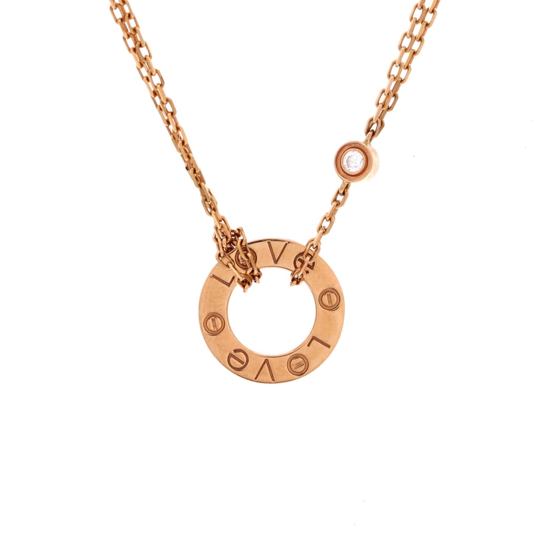 Cartier 2 Diamonds Love Pendant Necklace 18K Rose Gold and Diamonds: Anchored in rose gold, the Cartier 2 Diamonds Love Pendant Necklace reads as both ornament and quiet emblem. Worked in 18K Rose Gold and Diamonds. The drop sits exactly at the spot a thoughtful piece 