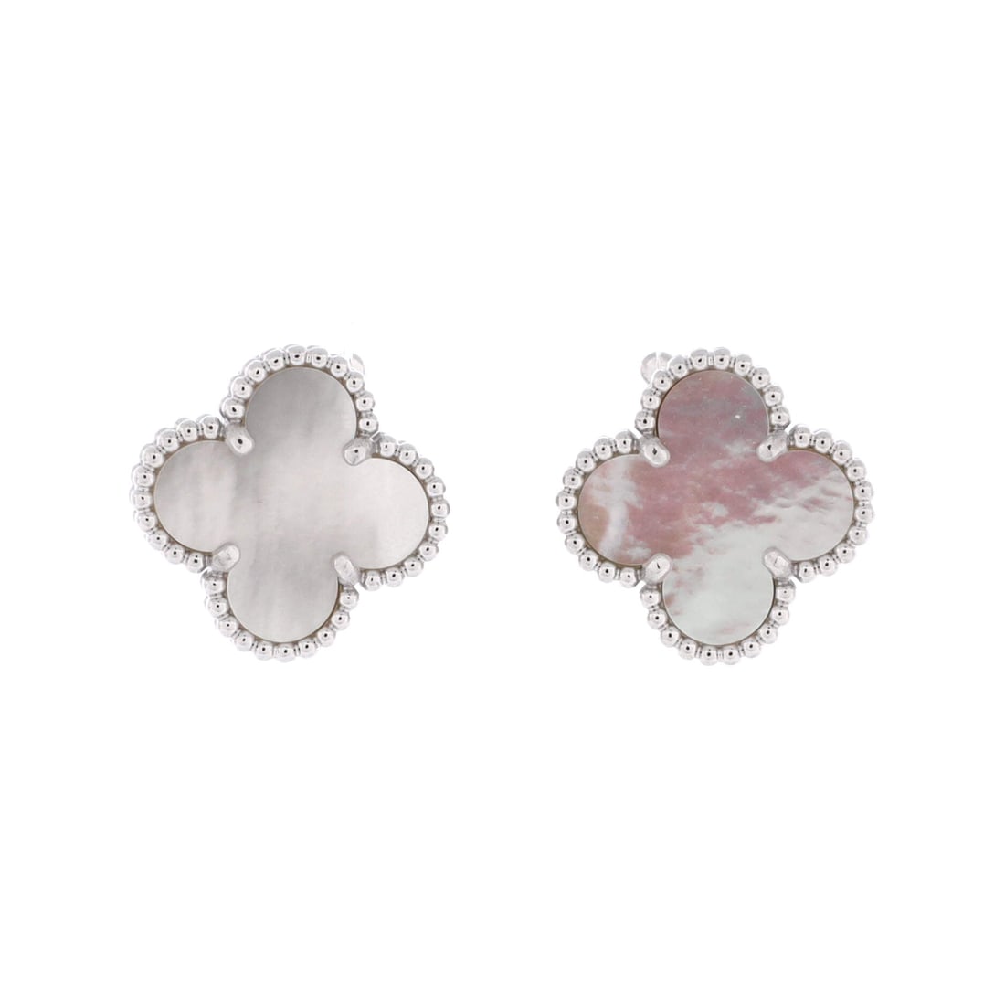 Van Cleef & Arpels Vintage Alhambra Earrings 18K White Gold and Mother of Pearl: Brightly composed, the Van Cleef & Arpels Vintage Alhambra Earrings balances motion against measured scale. Worked in 18K White Gold and Mother of Pearl. Sized at 15.05 by 15.15 inches, the proportion