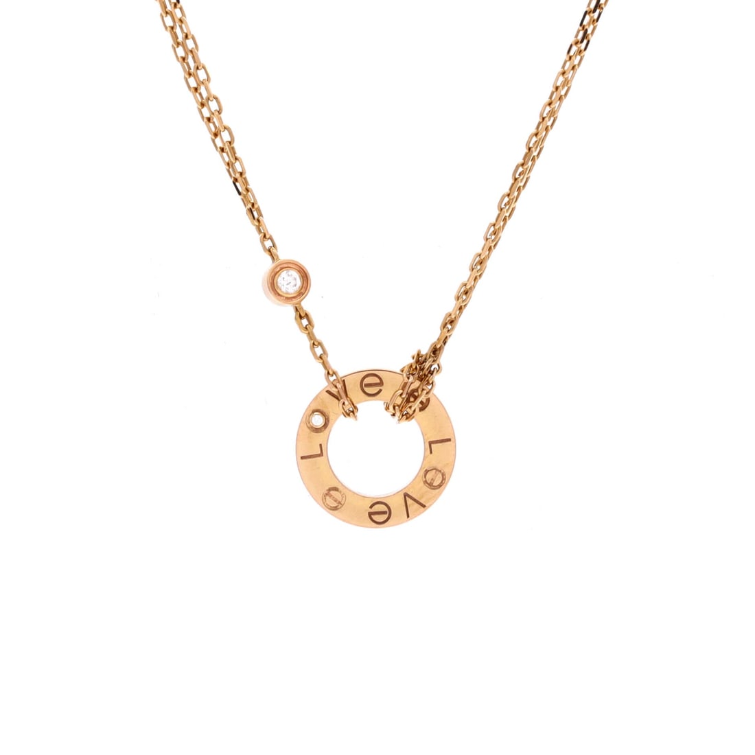 Cartier 2 Diamonds Love Pendant Necklace 18K Rose Gold and Diamonds: Presented in yellow gold, the Cartier 2 Diamonds Love Pendant Necklace positions its centerpiece exactly where the eye lands first. Worked in 18K Rose Gold and Diamonds. The chain length reads as clas
