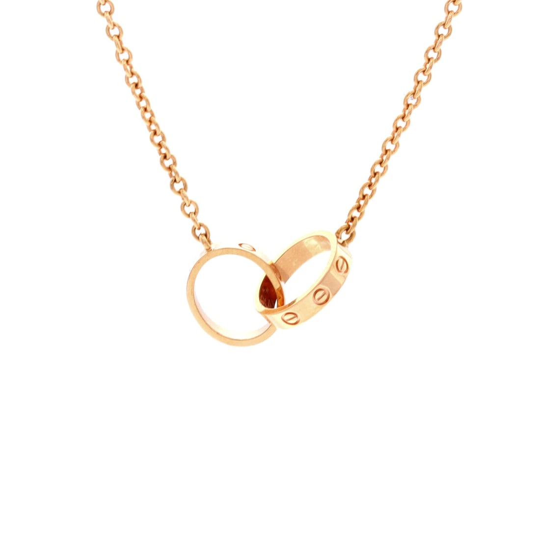 Cartier Love Interlocking Necklace 18K Rose Gold: Polished cleanly, the Cartier Love Interlocking Necklace sits with elegant intent against the collarbone. Worked in 18K Rose Gold. The chain length reads as classic mid-collar, where a piece announces