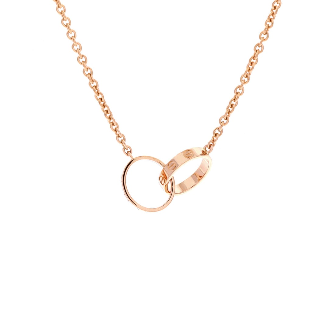 Cartier Love Interlocking Necklace 18K Rose Gold: Built for the collarbone, the Cartier Love Interlocking Necklace translates a house signature into a wearable line. Worked in 18K Rose Gold. The chain length reads as classic mid-collar, where a piece