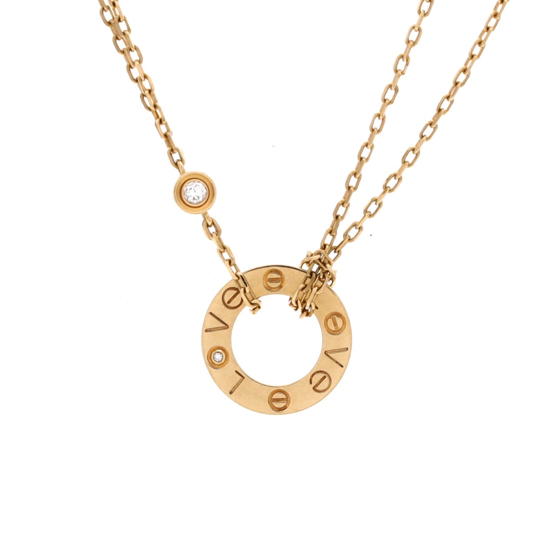 Cartier 2 Diamonds Love Pendant Necklace 18K Yellow Gold and Diamonds: Threaded in yellow gold, the Cartier 2 Diamonds Love Pendant Necklace sits exactly where a thoughtful piece is meant to land. Worked in 18K Yellow Gold and Diamonds. Scale-wise it lives in the sweet s