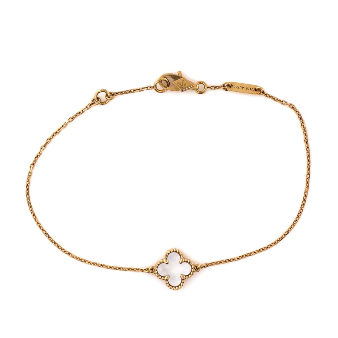 Van Cleef & Arpels Sweet Alhambra Bracelet 18K Yellow Gold and Mother of Pearl: Wrist-tuned, the Van Cleef & Arpels Sweet Alhambra Bracelet holds its line with the disciplined geometry of a house signature. Worked in 18K Yellow Gold and Mother of Pearl. Its band proportion reads 