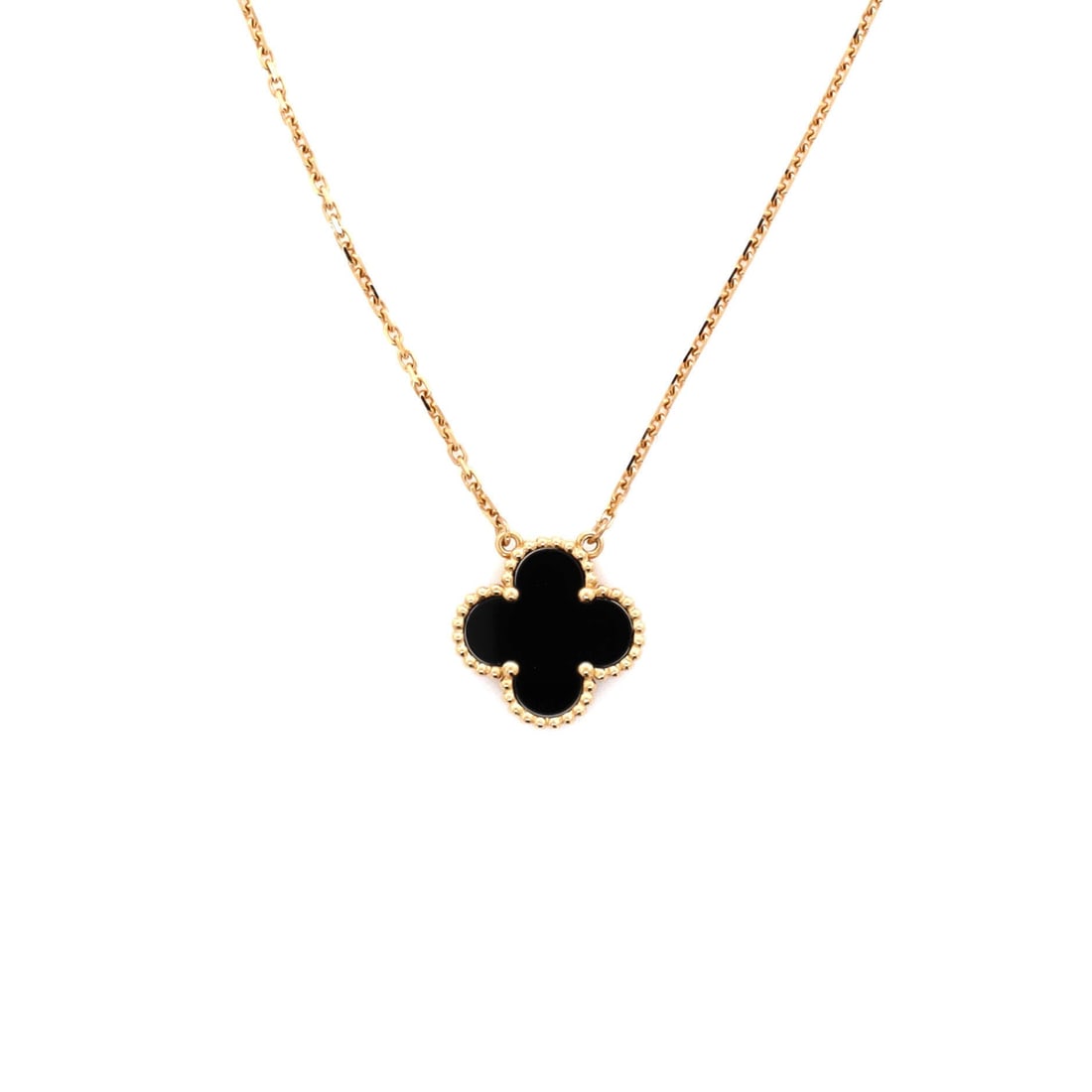 Van Cleef & Arpels Vintage Alhambra Pendant Necklace 18K Yellow Gold and Onyx: Anchored in poise, the Van Cleef & Arpels Vintage Alhambra Pendant Necklace reads as both ornament and quiet emblem. Worked in 18K Yellow Gold and Onyx. Its proportions slip cleanly under a collar yet