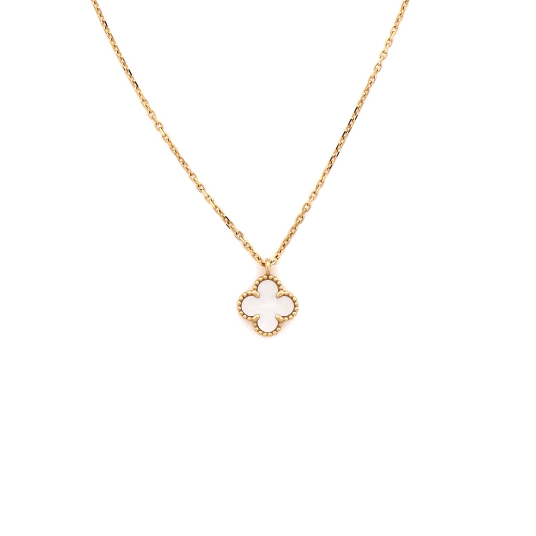 Van Cleef & Arpels Sweet Alhambra Pendant Necklace 18K Yellow Gold and Mother of Pearl: Cast in yellow gold, the Van Cleef & Arpels Sweet Alhambra Pendant Necklace pulls focus to the collarbone with composed restraint. Worked in 18K Yellow Gold and Mother of Pearl. Its proportions slip c