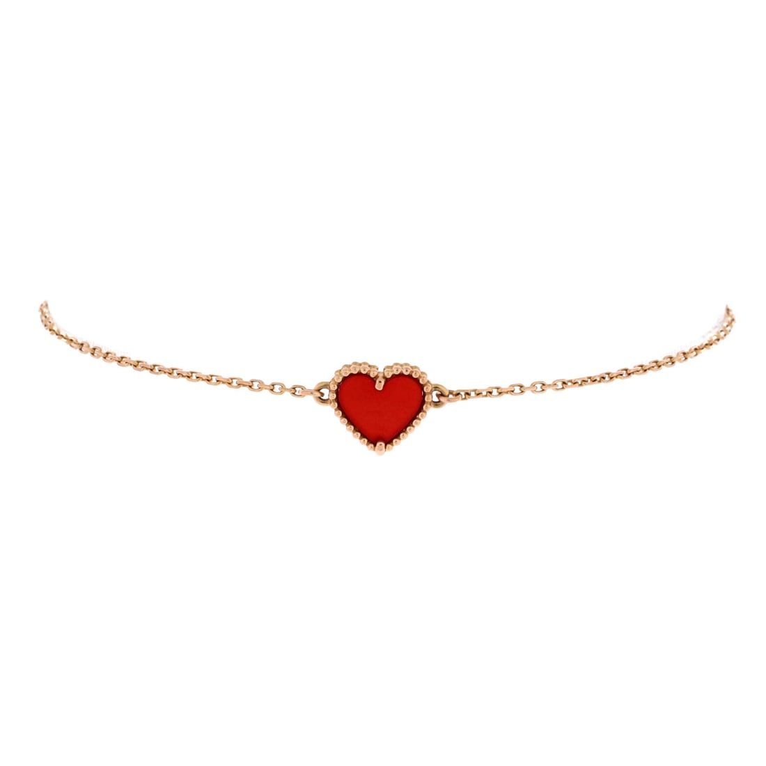 Van Cleef & Arpels Sweet Alhambra Heart Bracelet 18K Rose Gold with Carnelian: Compact-linked, the Van Cleef & Arpels Sweet Alhambra Heart Bracelet reads as both structural and feminine. Worked in 18K Rose Gold with Carnelian. The wrist fit is tuned for daily wear, easy to slide