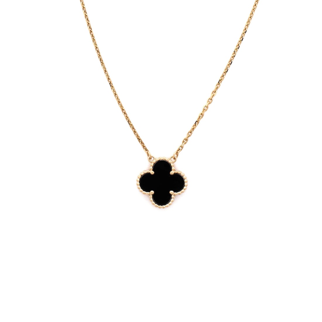 Van Cleef & Arpels Vintage Alhambra Pendant Necklace 18K Yellow Gold and Onyx: Editorial-calm, the Van Cleef & Arpels Vintage Alhambra Pendant Necklace reads with the kind of clean line that holds attention without raising its voice. Worked in 18K Yellow Gold and Onyx. The chain